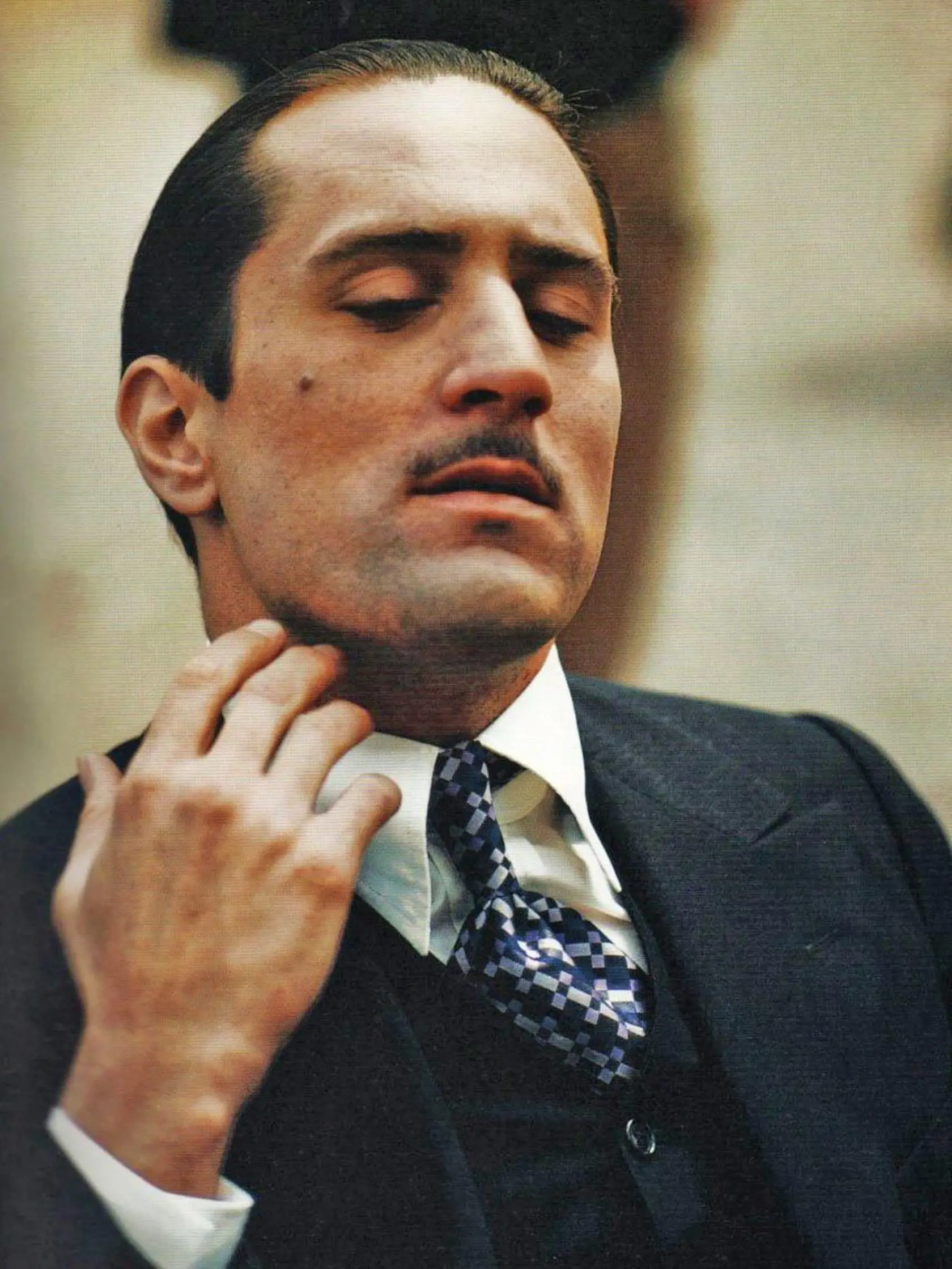 Robert De Niro ako mladý Vito Corleone v Krstnom otcovi