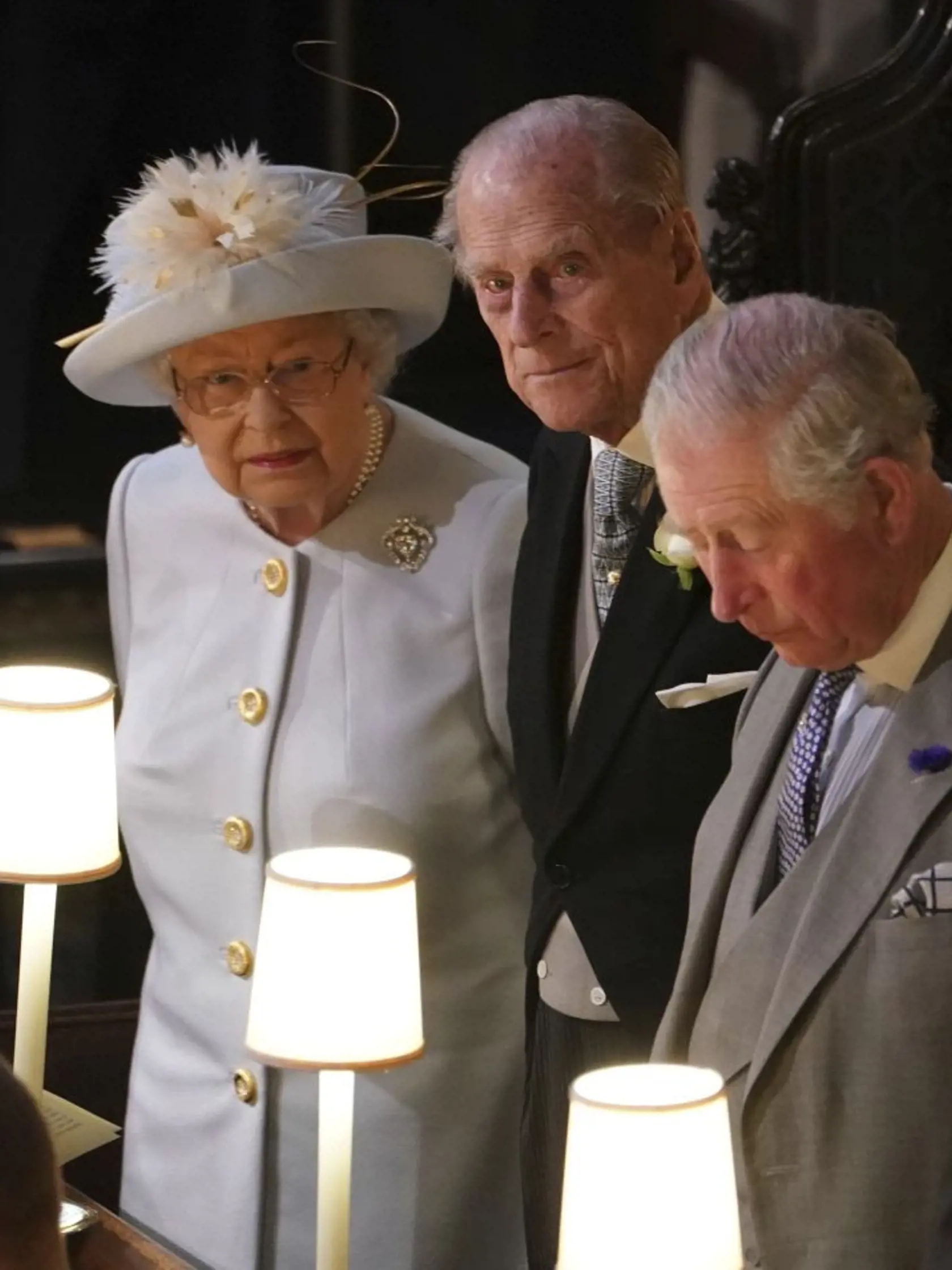 Britain's Queen Elizabeth II, Prince Philip and Prince Charles attend the wedding of Princess Eugenie of York and Jack Brooksbank in St Georgeâs Chapel, Windsor Castle, near London, England, Friday Oct. 12, 2018. (Owen Humphreys, Pool via AP)