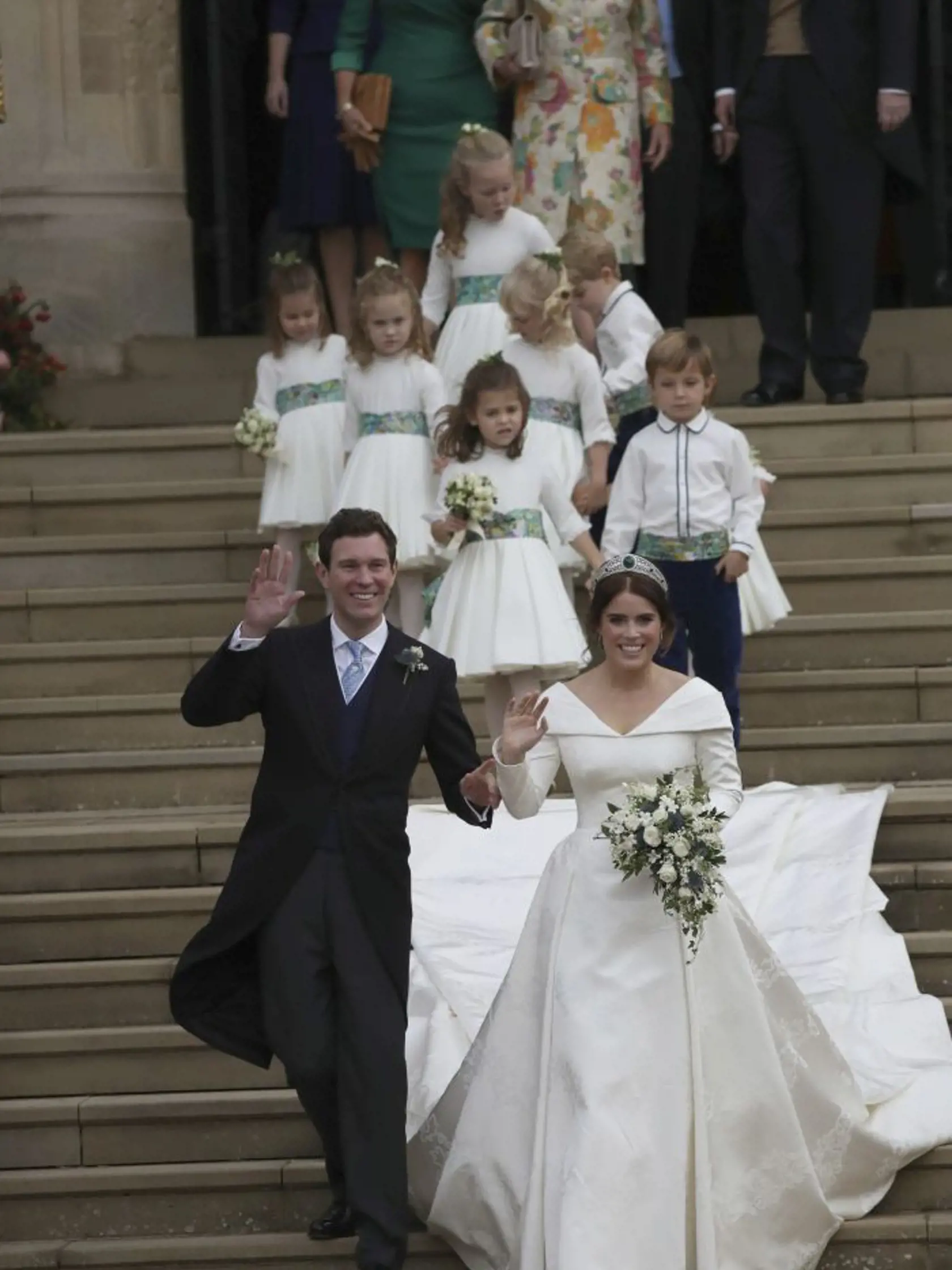 Princess Eugenie of York and Jack Brooksbank after their wedding ceremony at St Georgeâs Chapel, Windsor Castle, near London, England, Friday Oct. 12, 2018. (Andrew Matthews, Pool via AP)