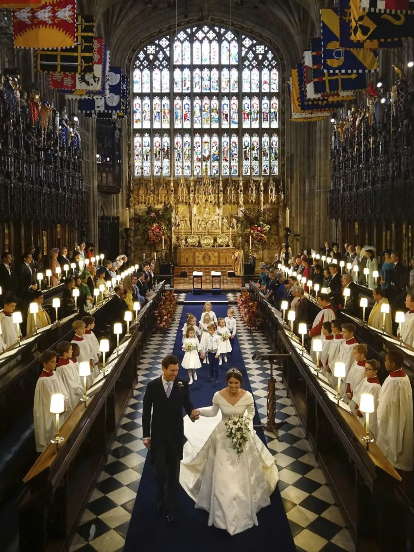 Princess Eugenie of York and Jack Brooksbank after their wedding ceremony at St Georgeâs Chapel, Windsor Castle, near London, England, Friday Oct. 12, 2018.  (Jonathan Brady, Pool via AP)