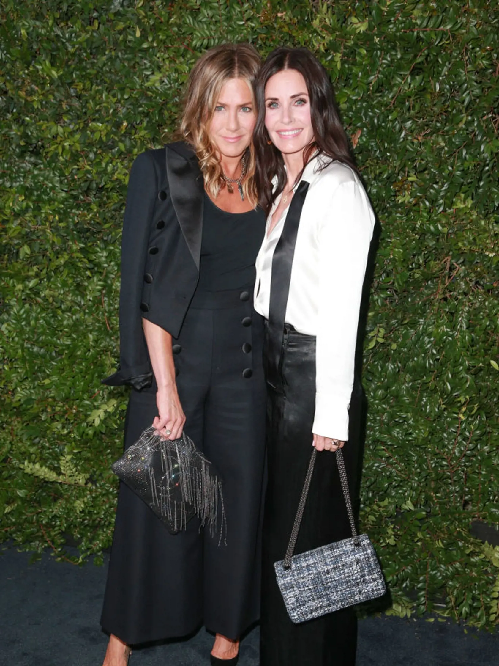 MALIBU, CA - JUNE 02:  Jennifer Aniston (L) and Courtney Cox attend the CHANEL Dinner Celebrating Our Majestic Oceans, A Benefit For NRDC on June 2, 2018 in Malibu, California.  (Photo by Rich Fury/Getty Images)