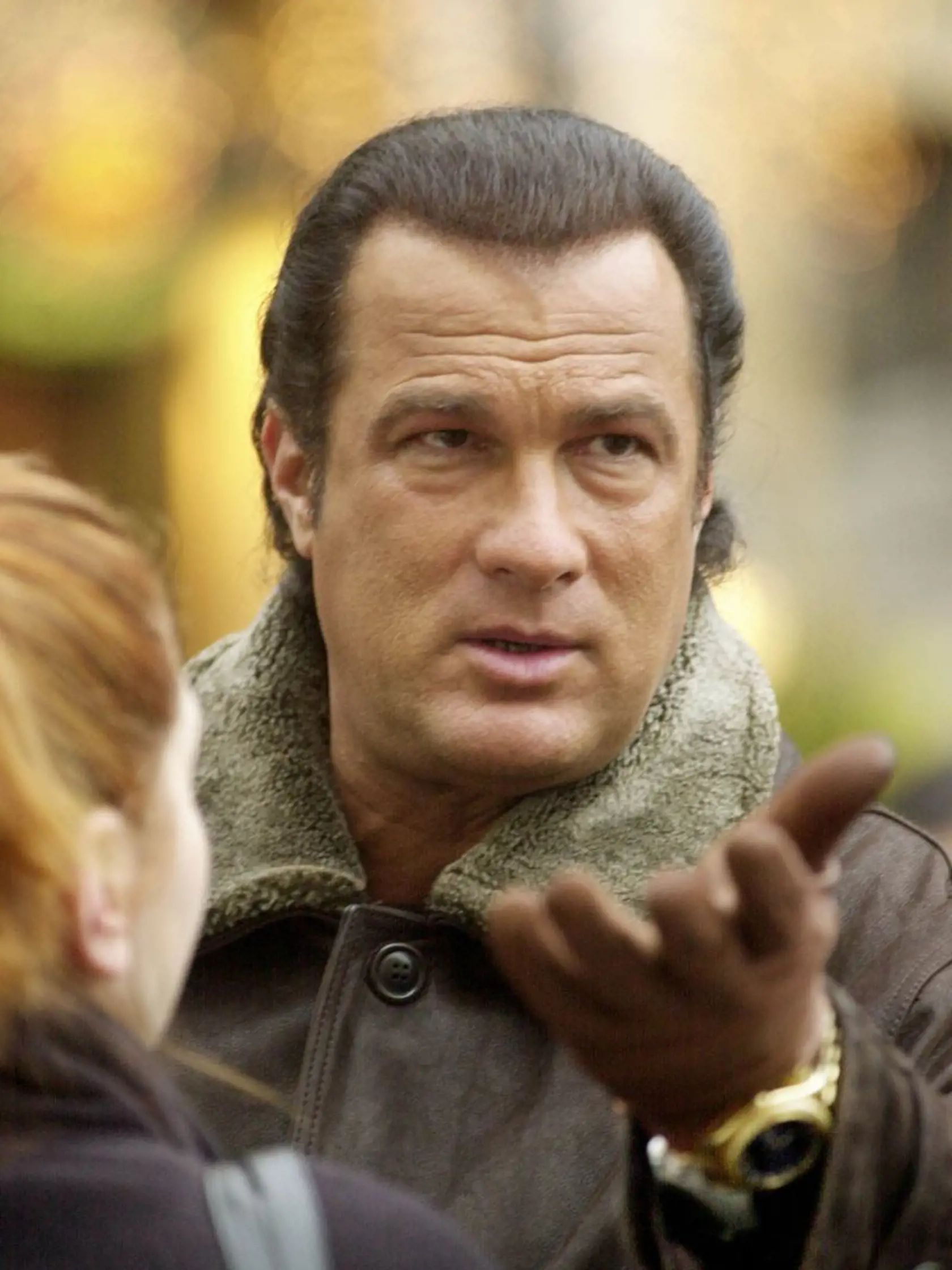 American actor Steven Seagal visits Warsaw's Old Town while shooting the movie "Foreigner " in Poland, Thursday, Jan.31, 2002. Seagal will stay in Poland for six weeks. (AP Photo /Czarek Sokolowski)