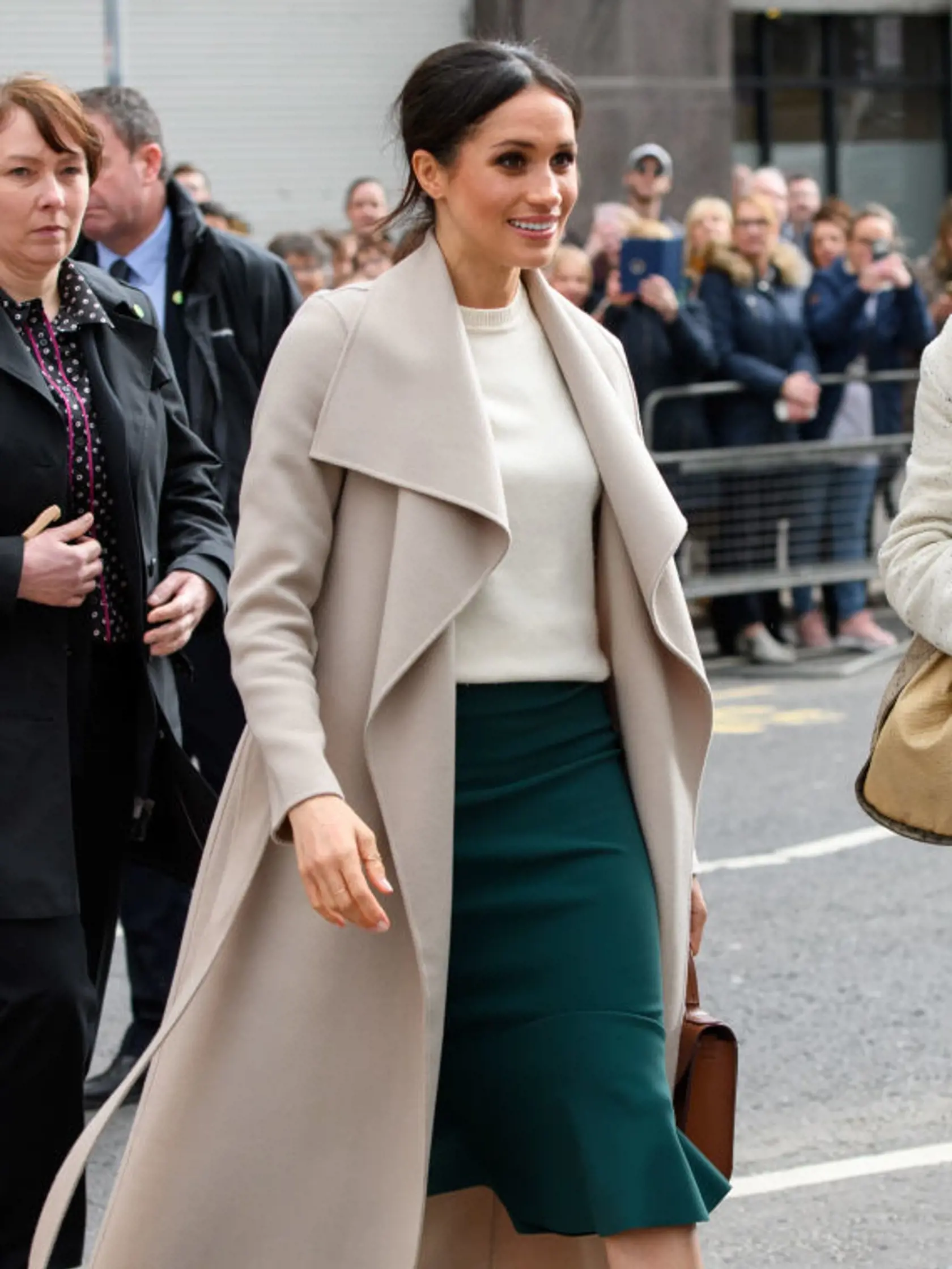 BELFAST, NORTHERN IRELAND - MARCH 23:  Meghan Markle and Prince Harry meet members of the public after visiting Crown Bar, a former Victorian gin palace owned by the National Trust, on March 23, 2018 in Belfast, Nothern Ireland.  (Photo by Tim Rooke - Pool/Getty Images)
