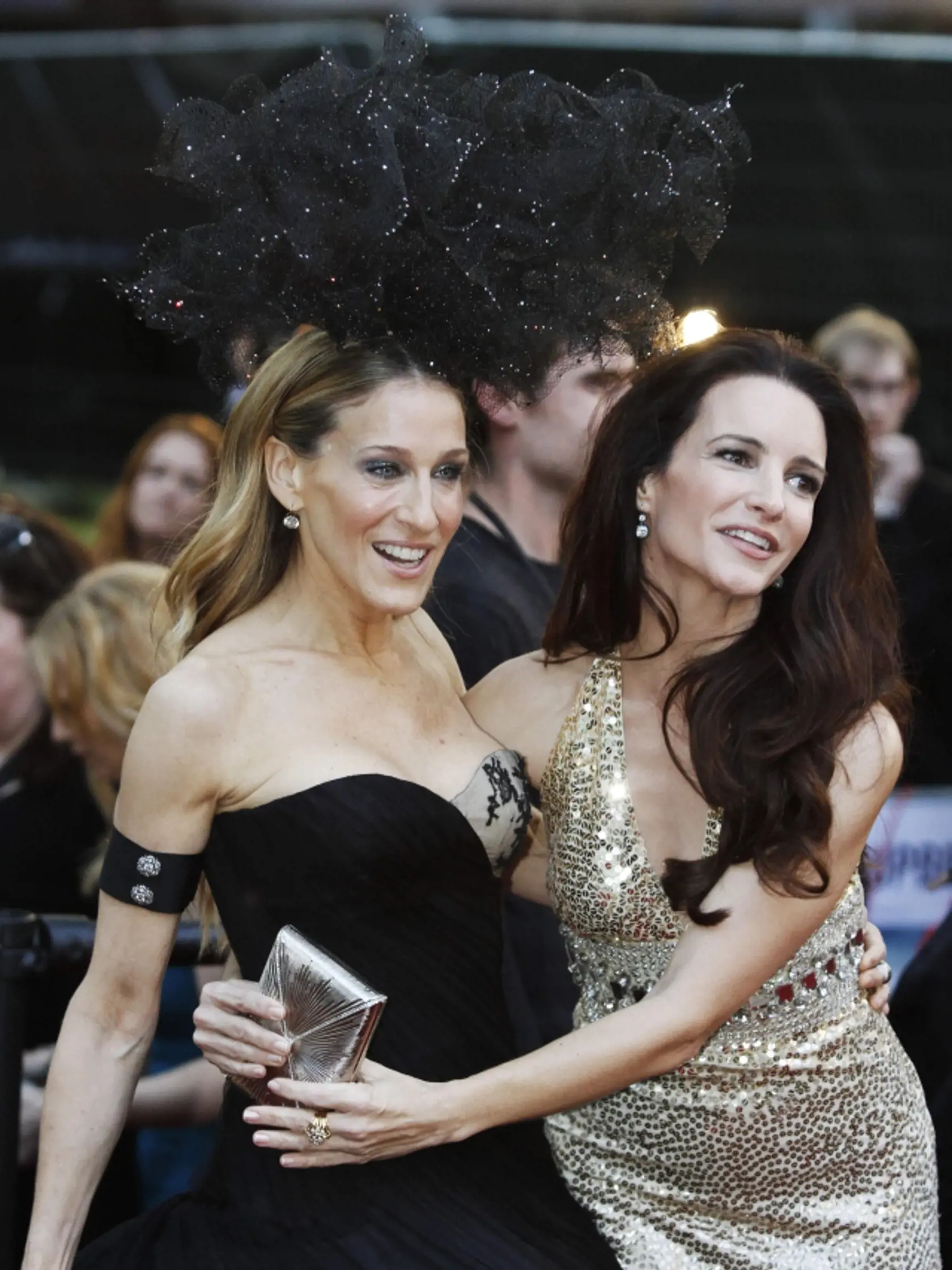 U.S. actress Sarah Jessica Parker, left, and Kristin Davis pose for the photographers as they arrive for the British premiere of their film 'Sex and the City 2', at a central London cinema, on Thursday, May 27, 2010. (AP Photo/Lefteris Pitarakis)