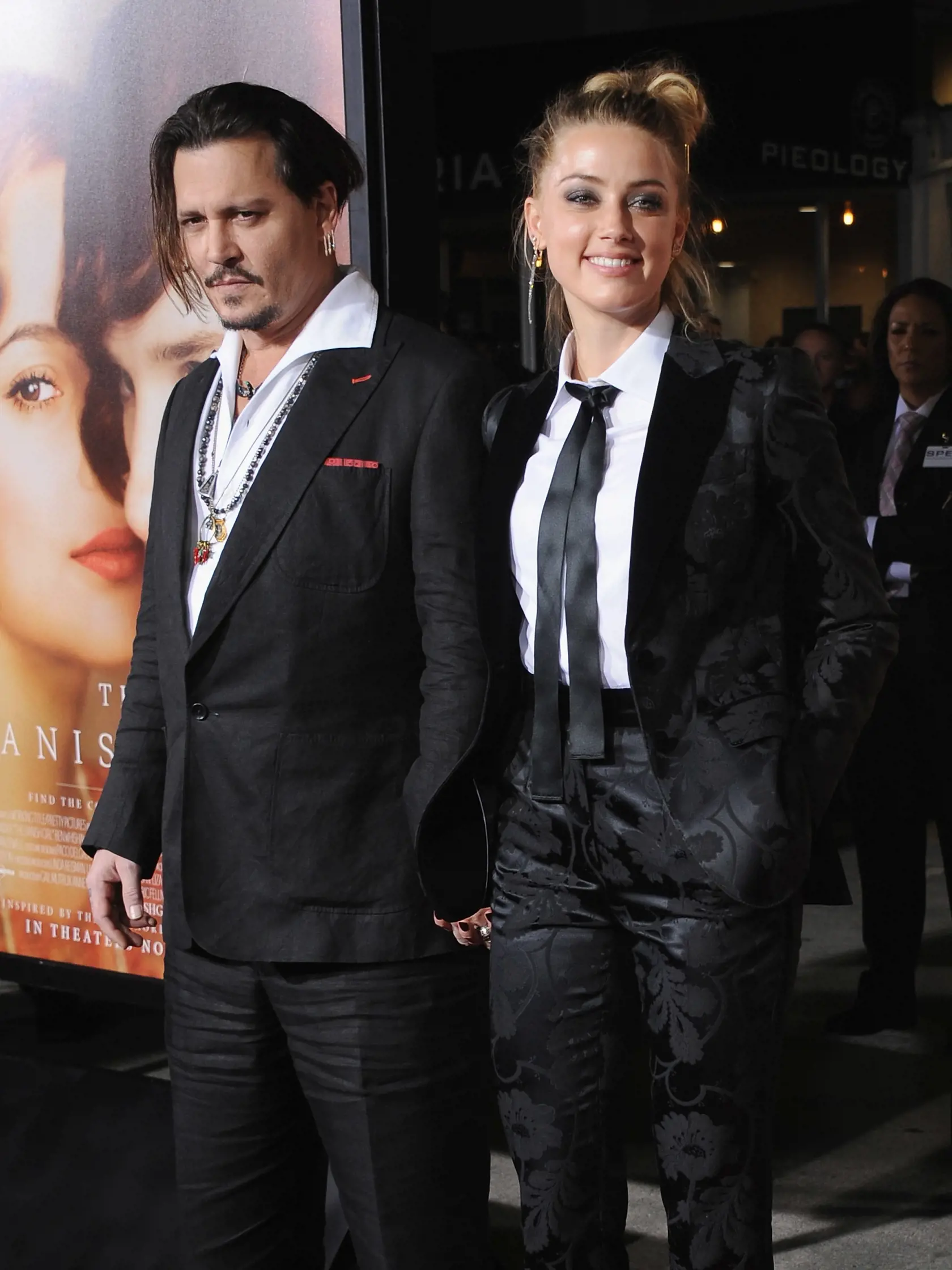 WESTWOOD, CA - NOVEMBER 21:  Actor Johnny Depp and wife actress Amber Heard arrive at the Los Angeles Premiere Of Focus Features' "The Danish Girl" at Westwood Village Theatre on November 21, 2015 in Westwood, California.  (Photo by Jon Kopaloff/FilmMagic)