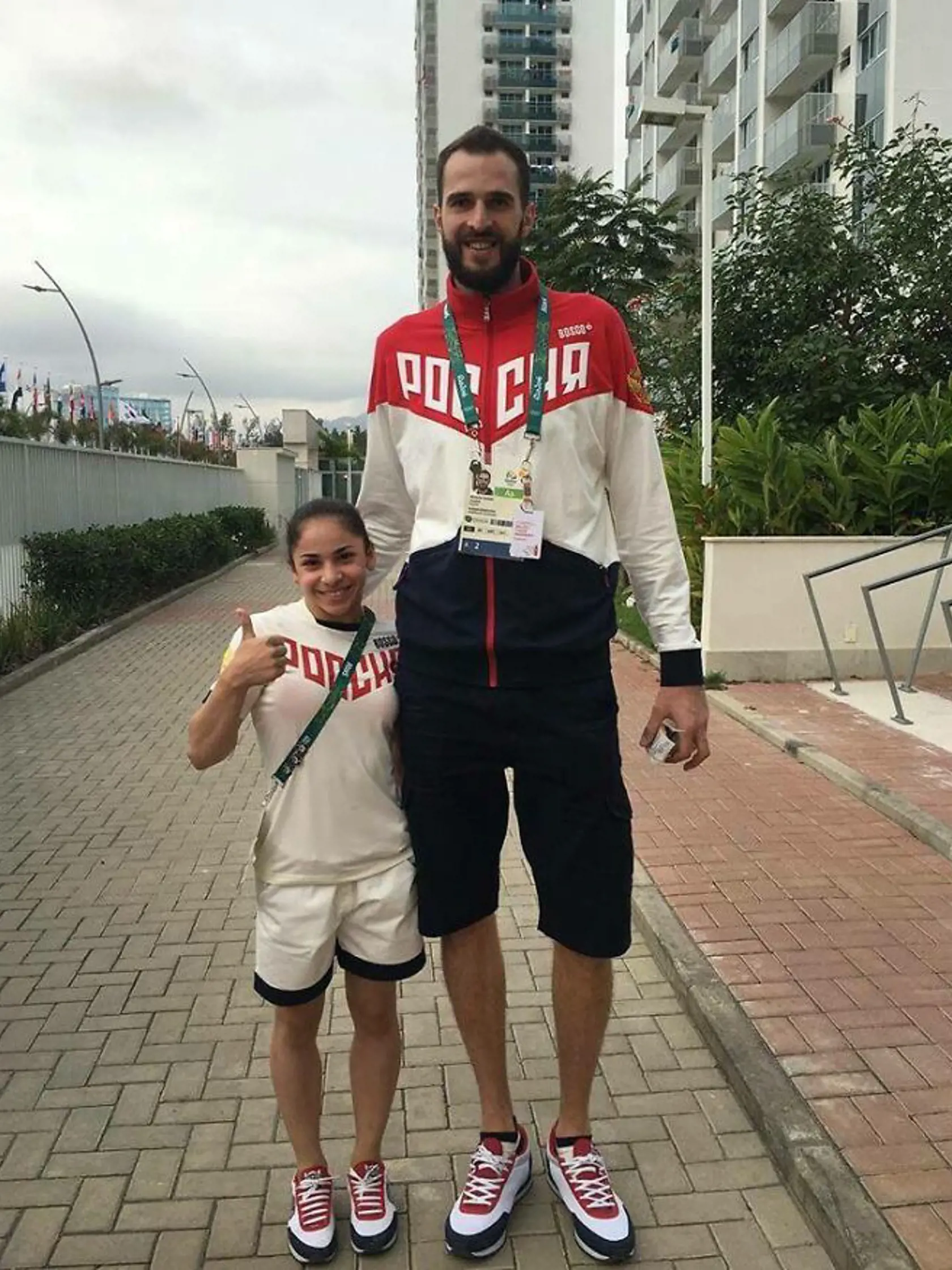 Ruský olympijský tím: volejbalista Alexander Volkov a gymnastka Seda Tutkhalyan.