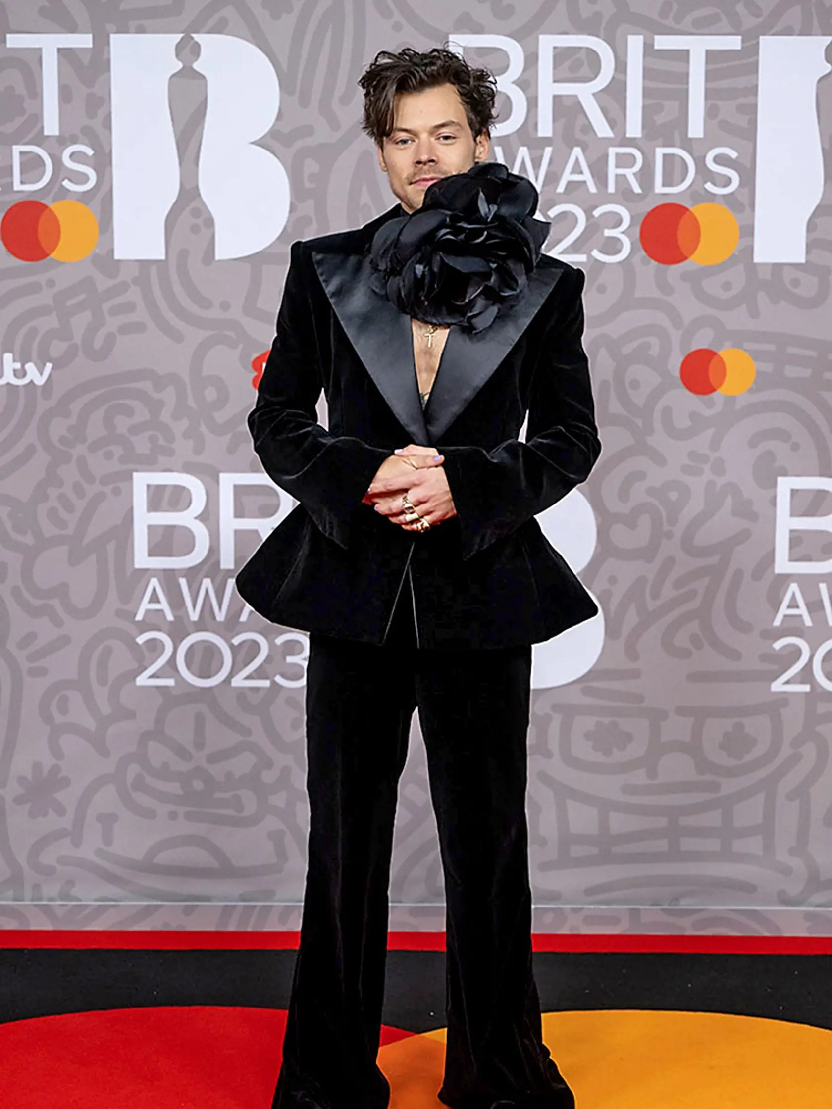 Spevák a módna ikona Harry Styles.