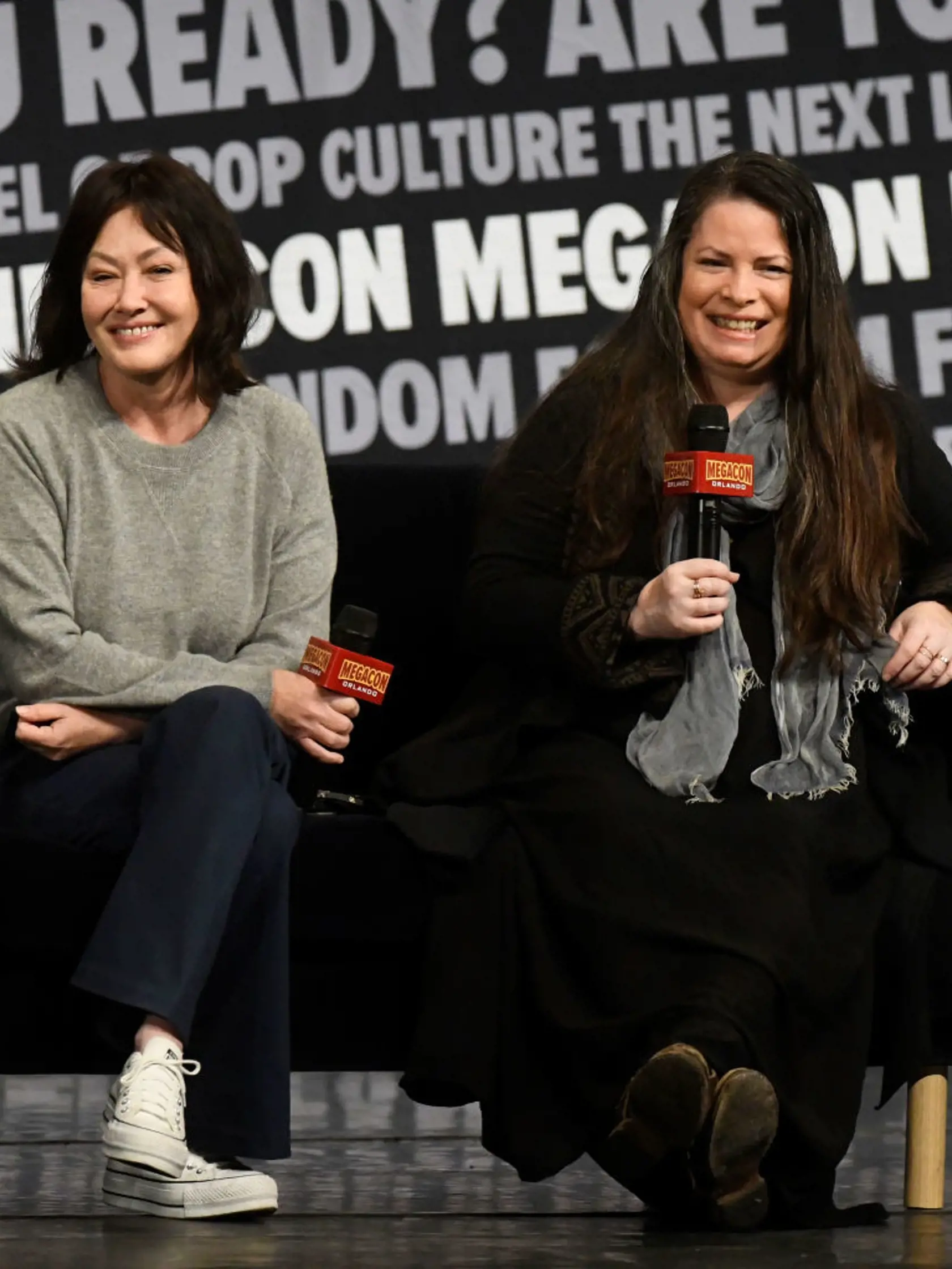 ORLANDO, FLORIDA - FEBRUARY 04: Shannen Doherty (L) and Holly Marie Combs speak during a Q&A session at MegaCon Orlando 2024 at Orange County Convention Center on February 04, 2024 in Orlando, Florida. (Photo by Gerardo Mora/Getty Images)