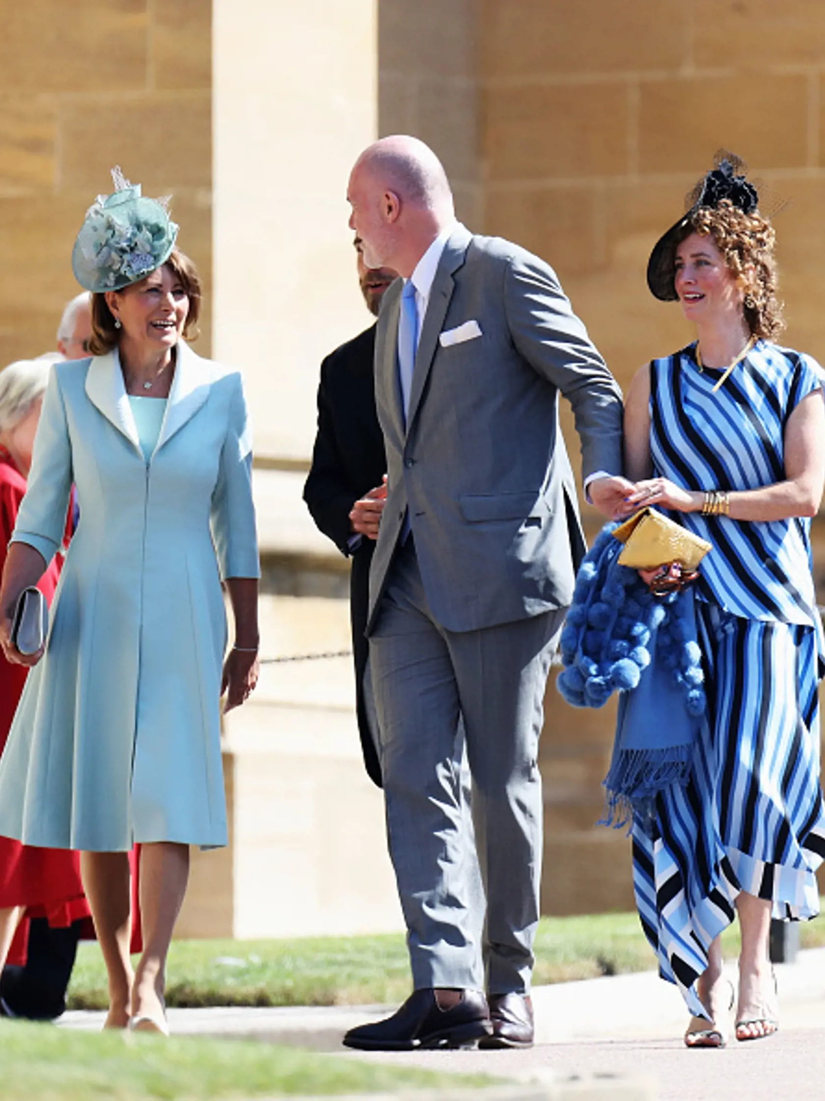 WINDSOR, ENGLAND - MAY 19:  (L-R) Carole Middleton, Paddy Harverson and Mel Harverson arrives at the wedding of Prince Harry to Ms Meghan Markle at St George's Chapel, Windsor Castle on May 19, 2018 in Windsor, England.  (Photo by Chris Jackson/Getty Images)