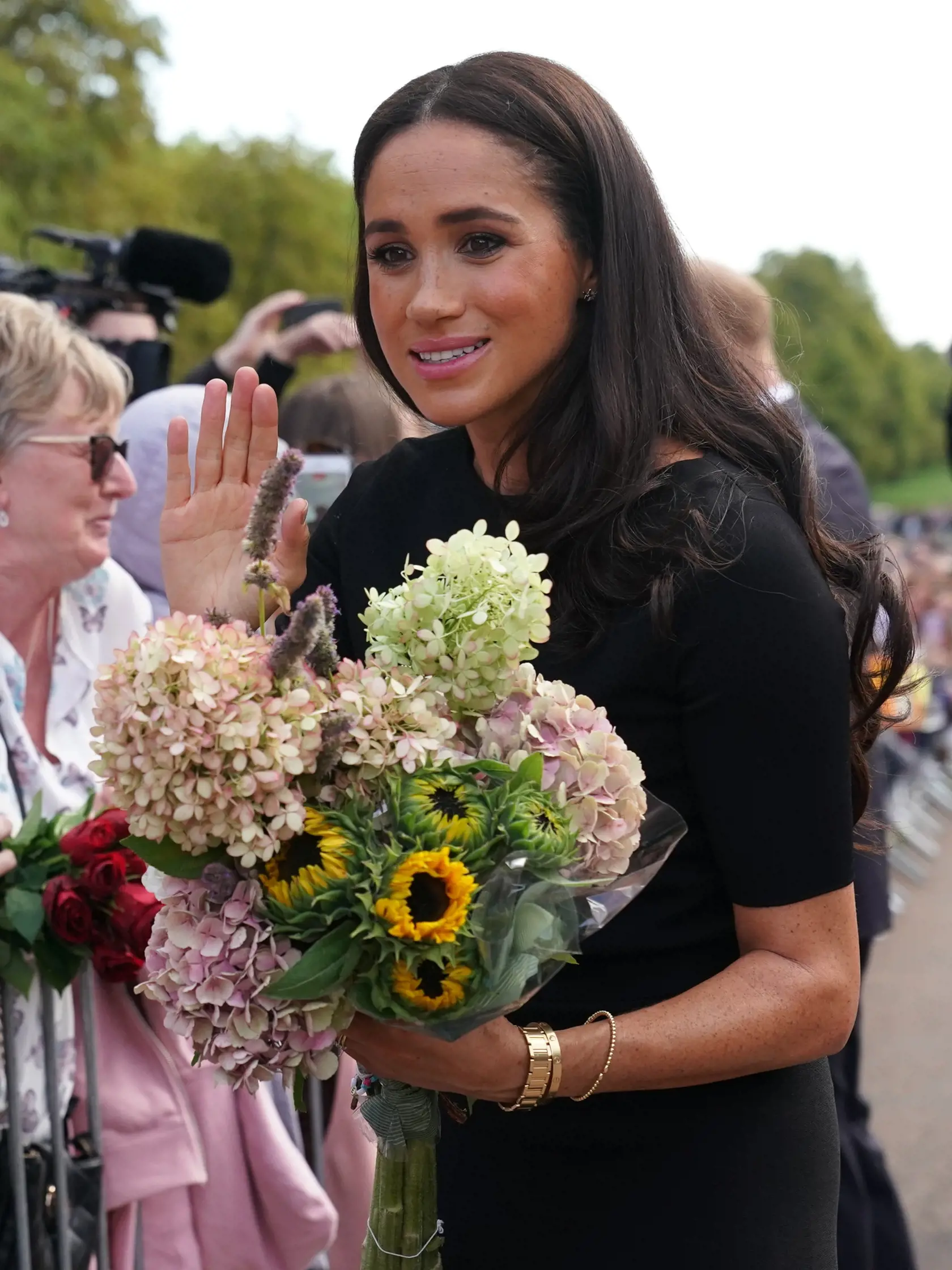 The Prince and Princess of Wales Accompanied By The Duke And Duchess Of Sussex Greet Wellwishers Outside Windsor Castle