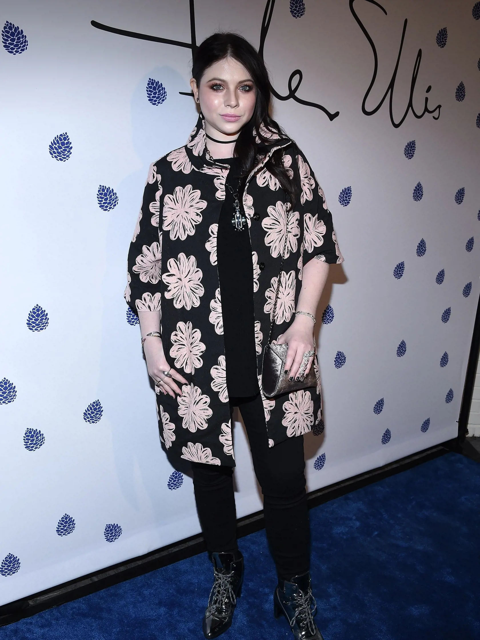 Michelle Trachtenberg sa na fotkách takmer vôbec neusmieva.