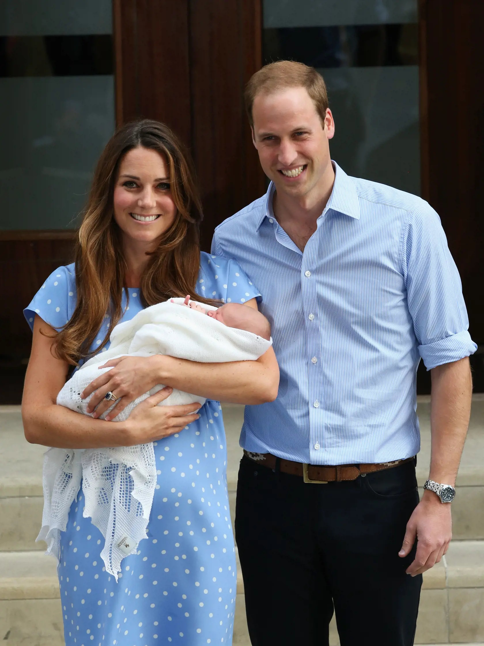 LONDON, ENGLAND - JULY 23:  Prince William, Duke of Cambridge and Catherine, Duchess of Cambridge, depart The Lindo Wing with their newborn son at St Mary's Hospital on July 23, 2013 in London, England. The Duchess of Cambridge yesterday gave birth to a boy at 16.24 BST and weighing 8lb 6oz, with Prince William at her side. The baby, as yet unnamed, is third in line to the throne and becomes the Prince of Cambridge.  (Photo by Chris Jackson/Getty Images)
