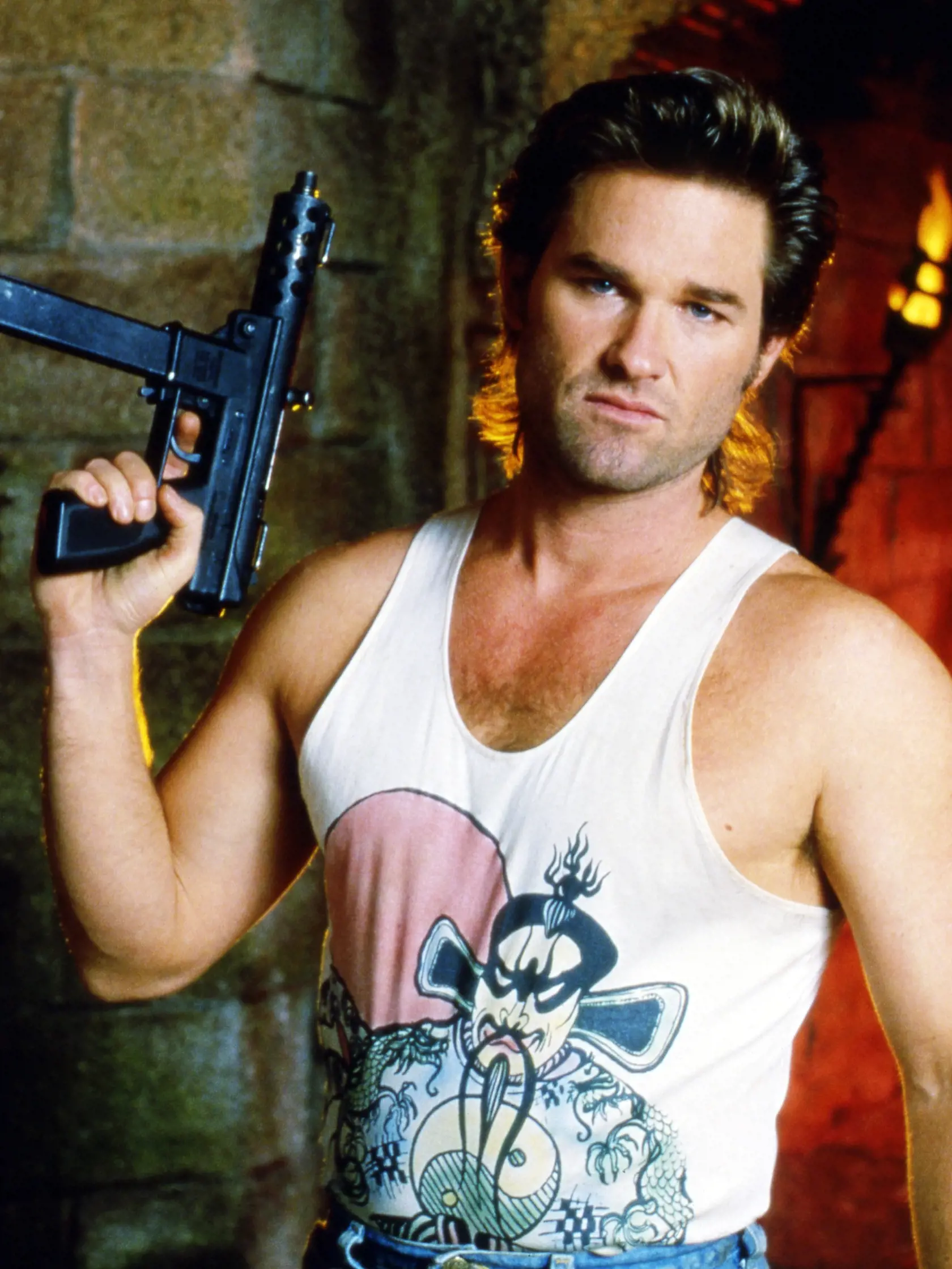 American actor Kurt Russell as Jack Burton in 'Big Trouble In Little China', directed by John Carpenter, 1986. (Photo by Silver Screen Collection/Getty Images)