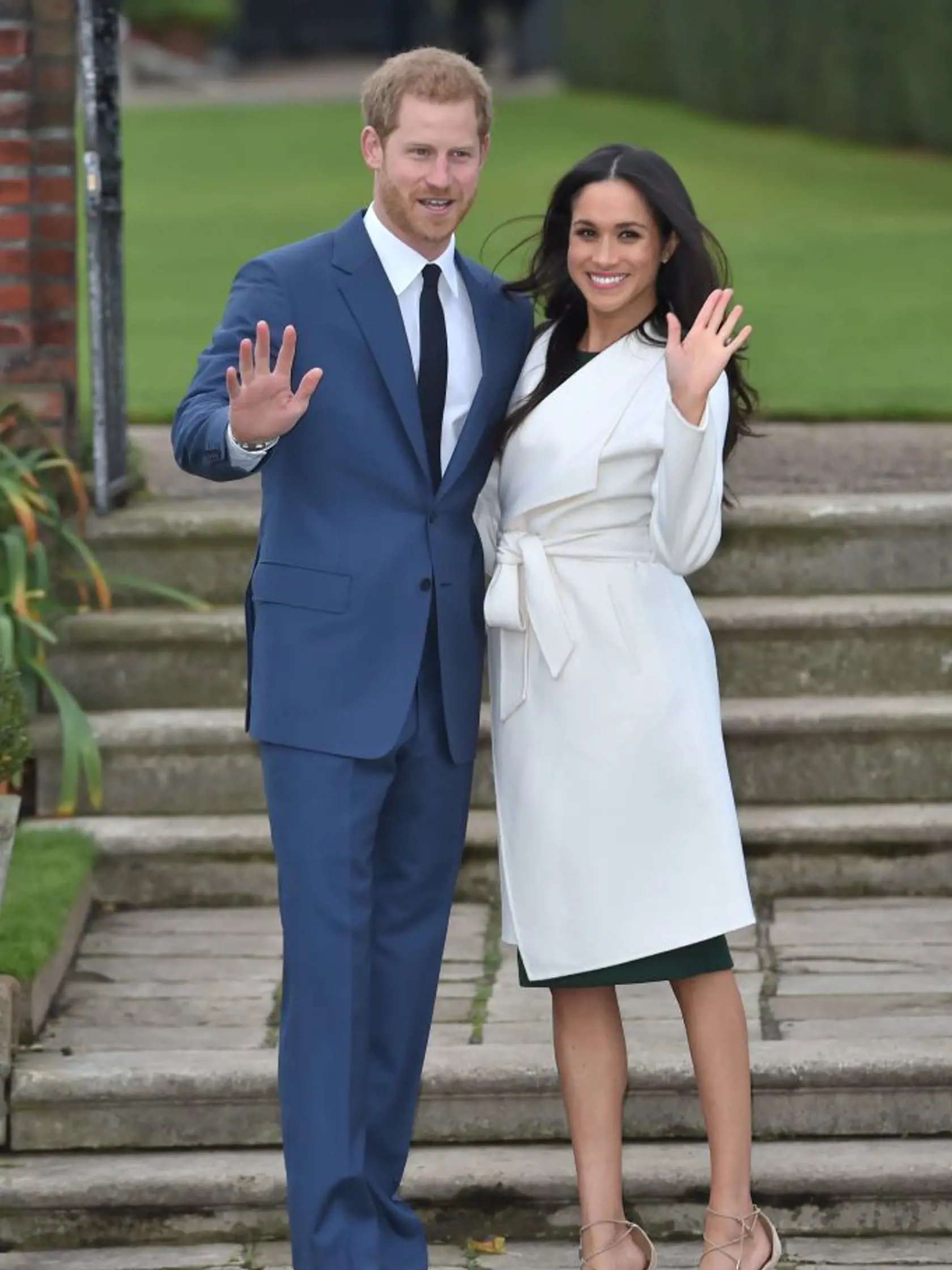 LONDON, ENGLAND - NOVEMBER 27:  Prince Harry and actress Meghan Markle during an official photocall to announce their engagement at The Sunken Gardens at Kensington Palace on November 27, 2017 in London, England.  Prince Harry and Meghan Markle have been a couple officially since November 2016 and are due to marry in Spring 2018.  (Photo by Eddie Mulholland-WPA Pool/Getty Images)