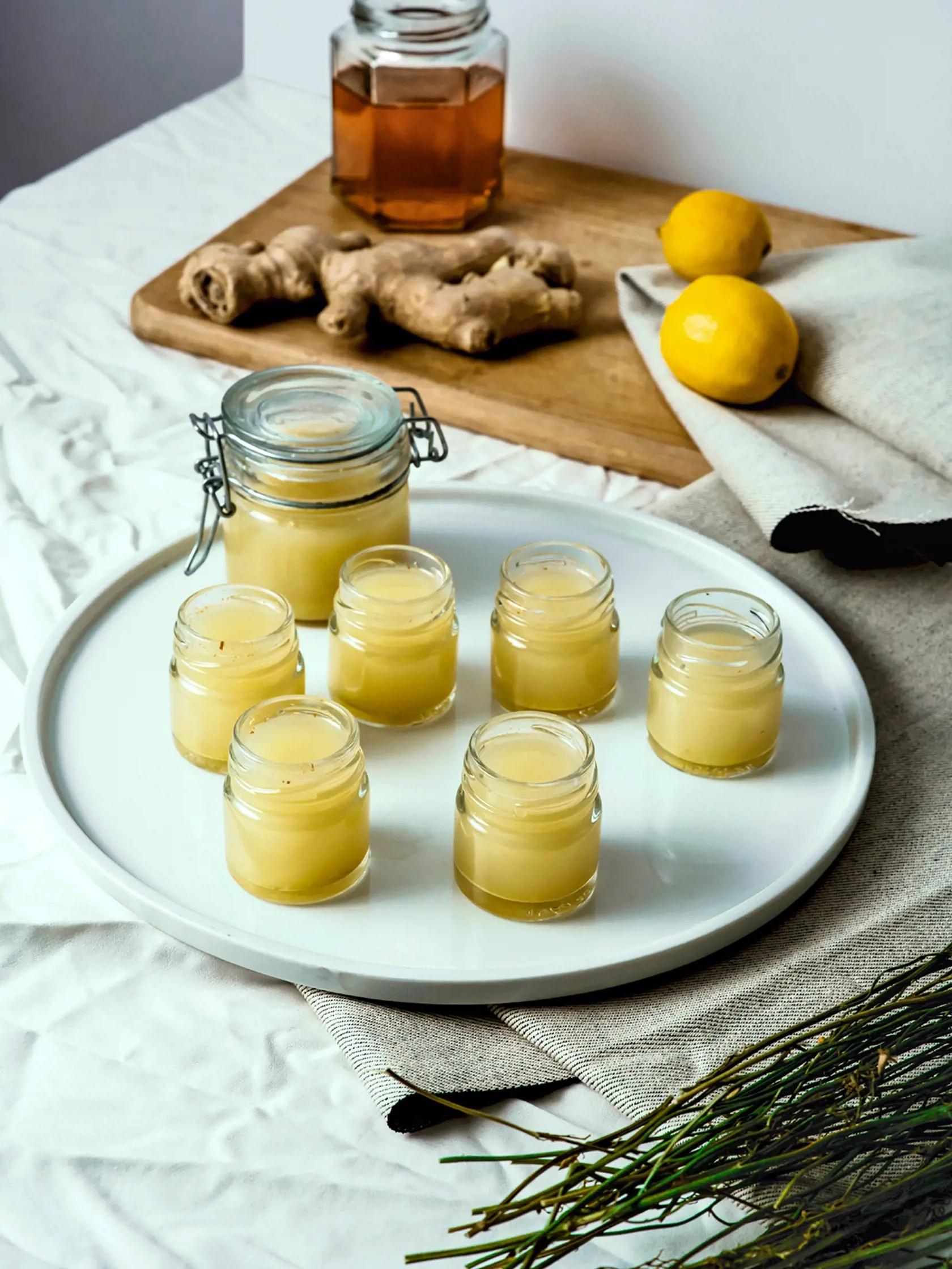 Ginger,Shots,,Honey,And,Lime,On,The,Table