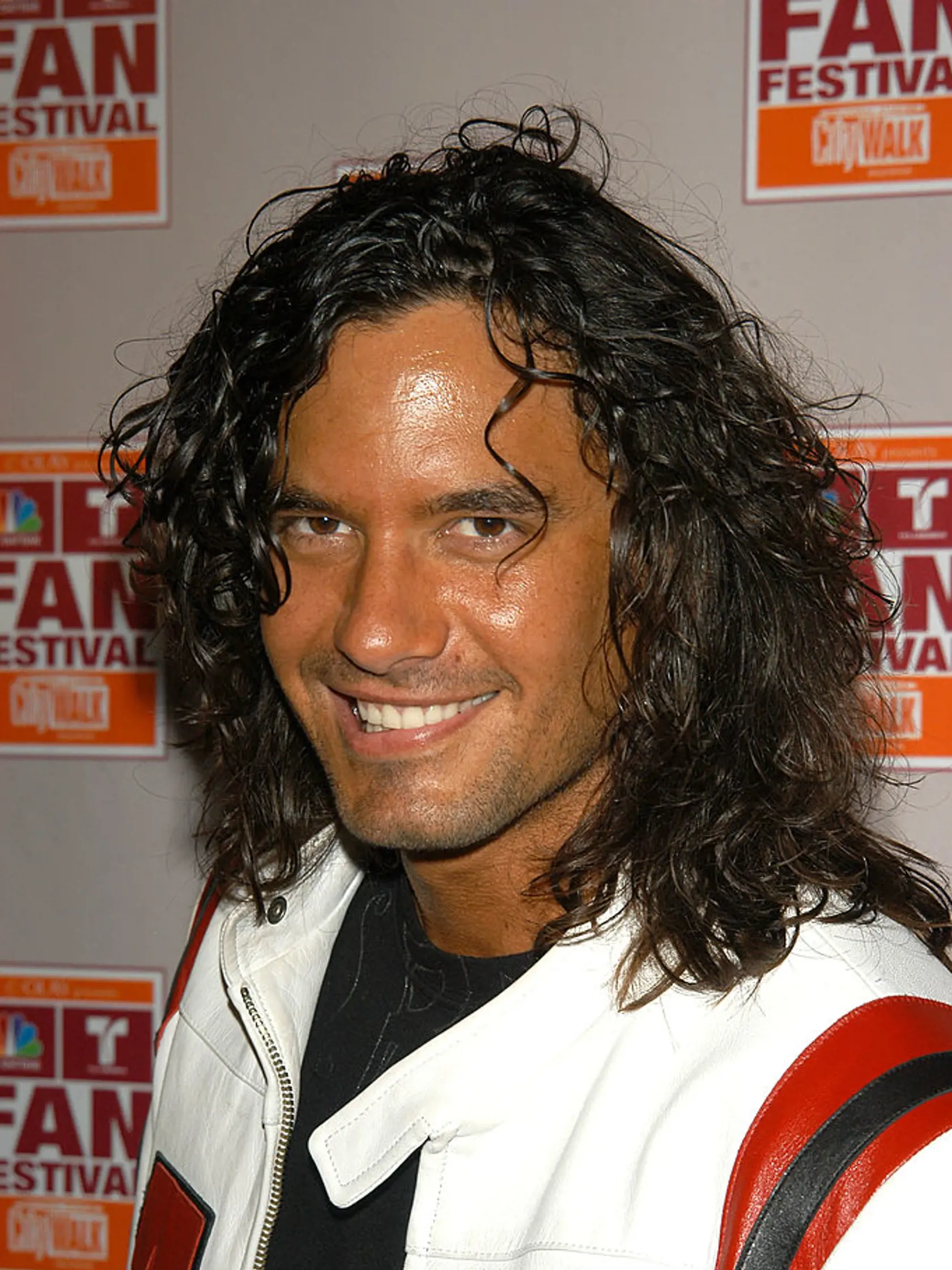 HOLLYWOOD - MARCH 20:  Actor Mario Cimarro poses during day 1 of NBC's Fan Festival 2004 held on March 20, 2004 at Universal City Walk, in Hollywood, California. (Photo by Stephen Shugerman/Getty Images)