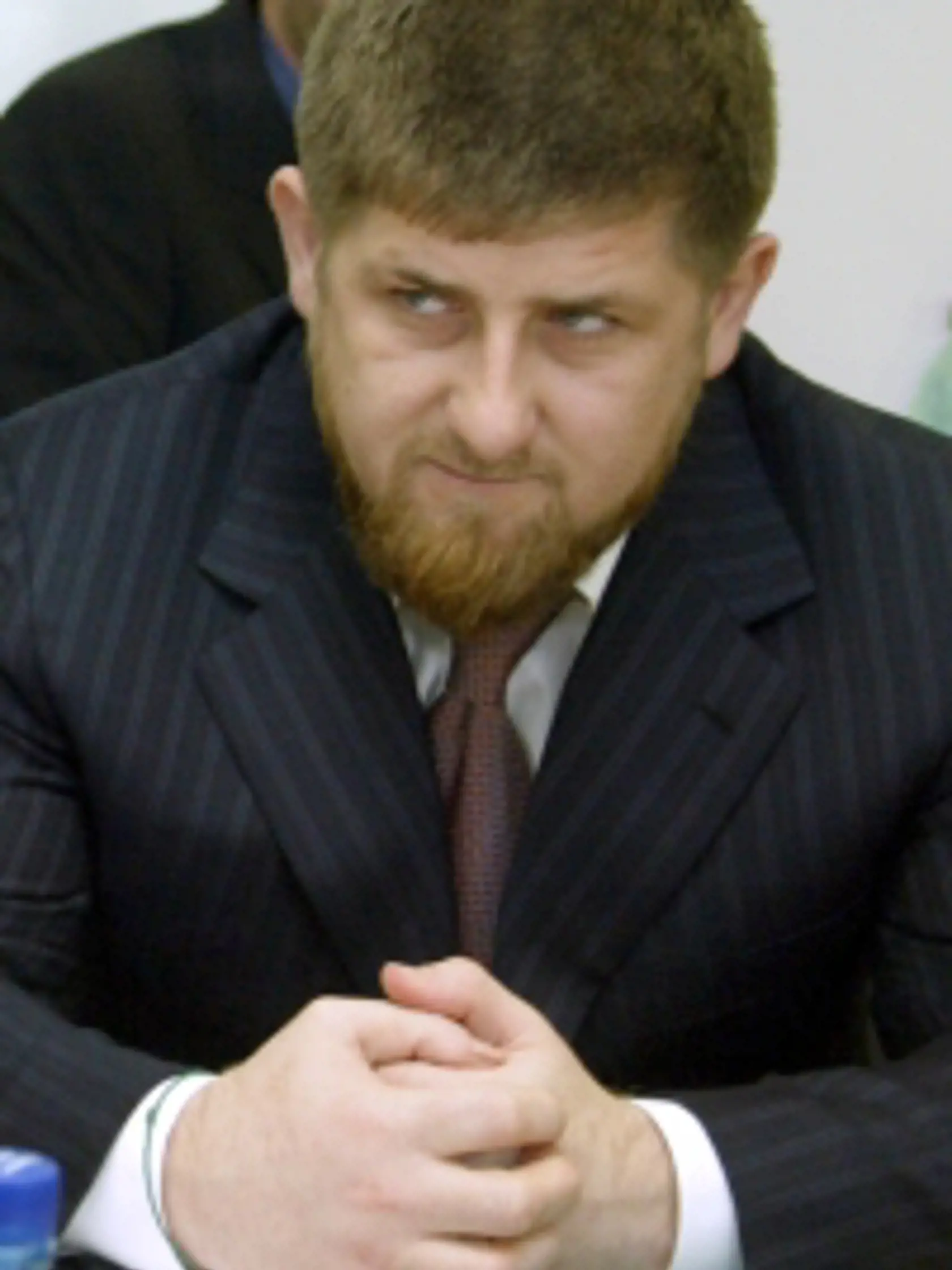 Acting Chechen Prime Minister Ramzan Kadyrov listens to U.N. High Commissioner for Human Rights Louise Arbour (not pictured) during a meeting in the Chechen capital of Grozny February 21, 2006. Arbour is visiting Chechnya within her trip to Russia and the North Caucasus.  REUTERS/Said Tsarnayev