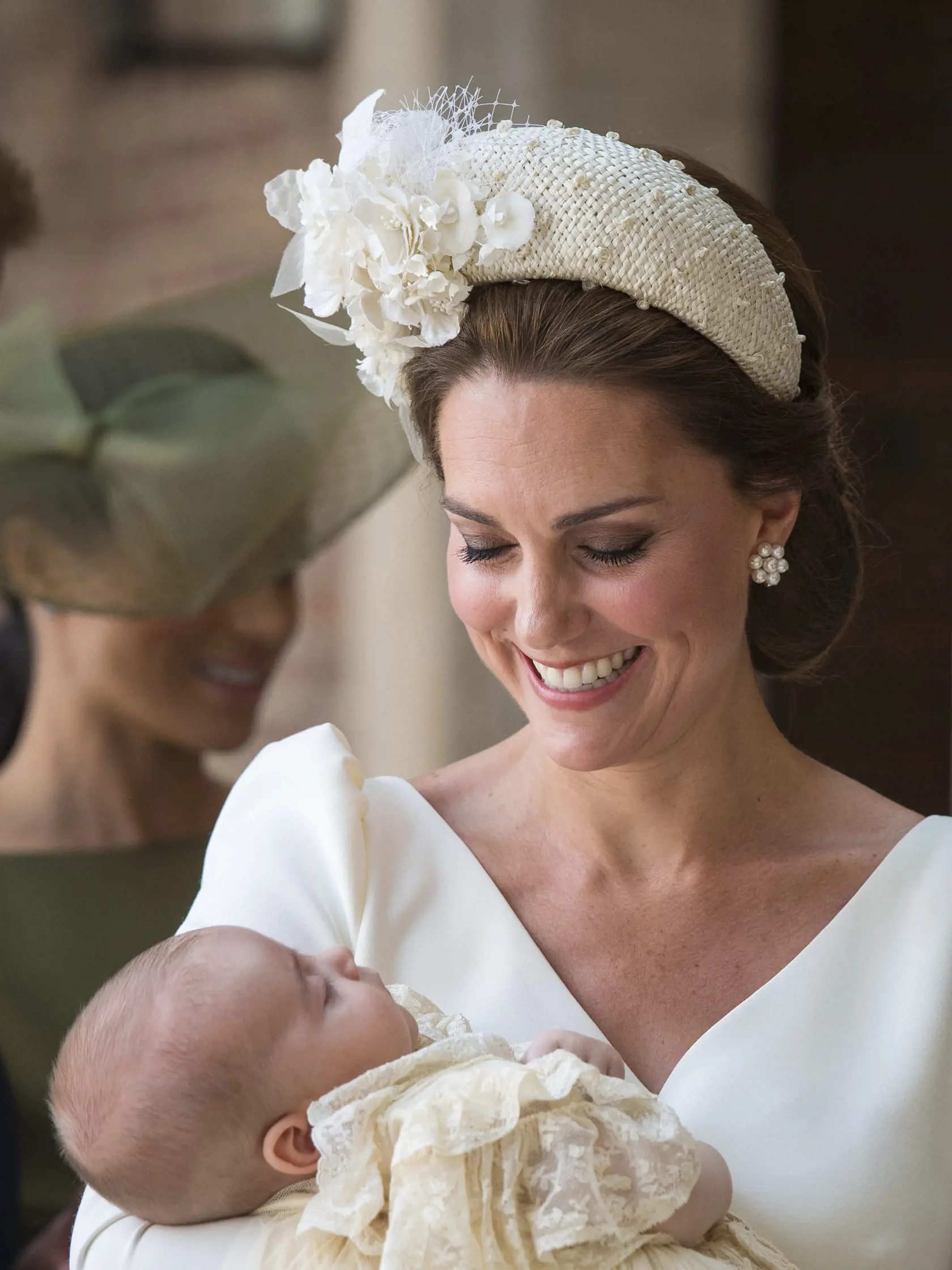 Kate, Duchess of Cambridge carries Prince Louis as they arrive for his christening service at the Chapel Royal, St James's Palace, London, Monday, July 9, 2018. (Dominic Lipinski/Pool Photo via AP)