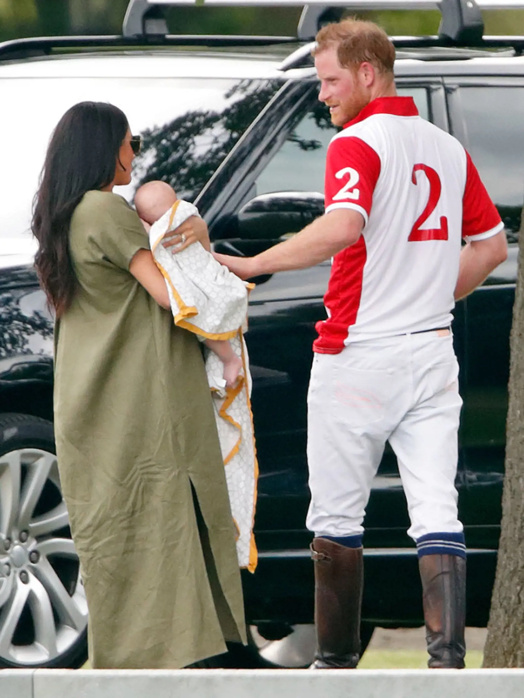 WOKINGHAM, UNITED KINGDOM - JULY 10: (EMBARGOED FOR PUBLICATION IN UK NEWSPAPERS UNTIL 24 HOURS AFTER CREATE DATE AND TIME) Meghan, Duchess of Sussex, Archie Harrison Mountbatten-Windsor and Prince Harry, Duke of Sussex attend the King Power Royal Charity Polo Match, in which Prince William, Duke of Cambridge and Prince Harry, Duke of Sussex were competing for the Khun Vichai Srivaddhanaprabha Memorial Polo Trophy at Billingbear Polo Club on July 10, 2019 in Wokingham, England. (Photo by Max Mum
