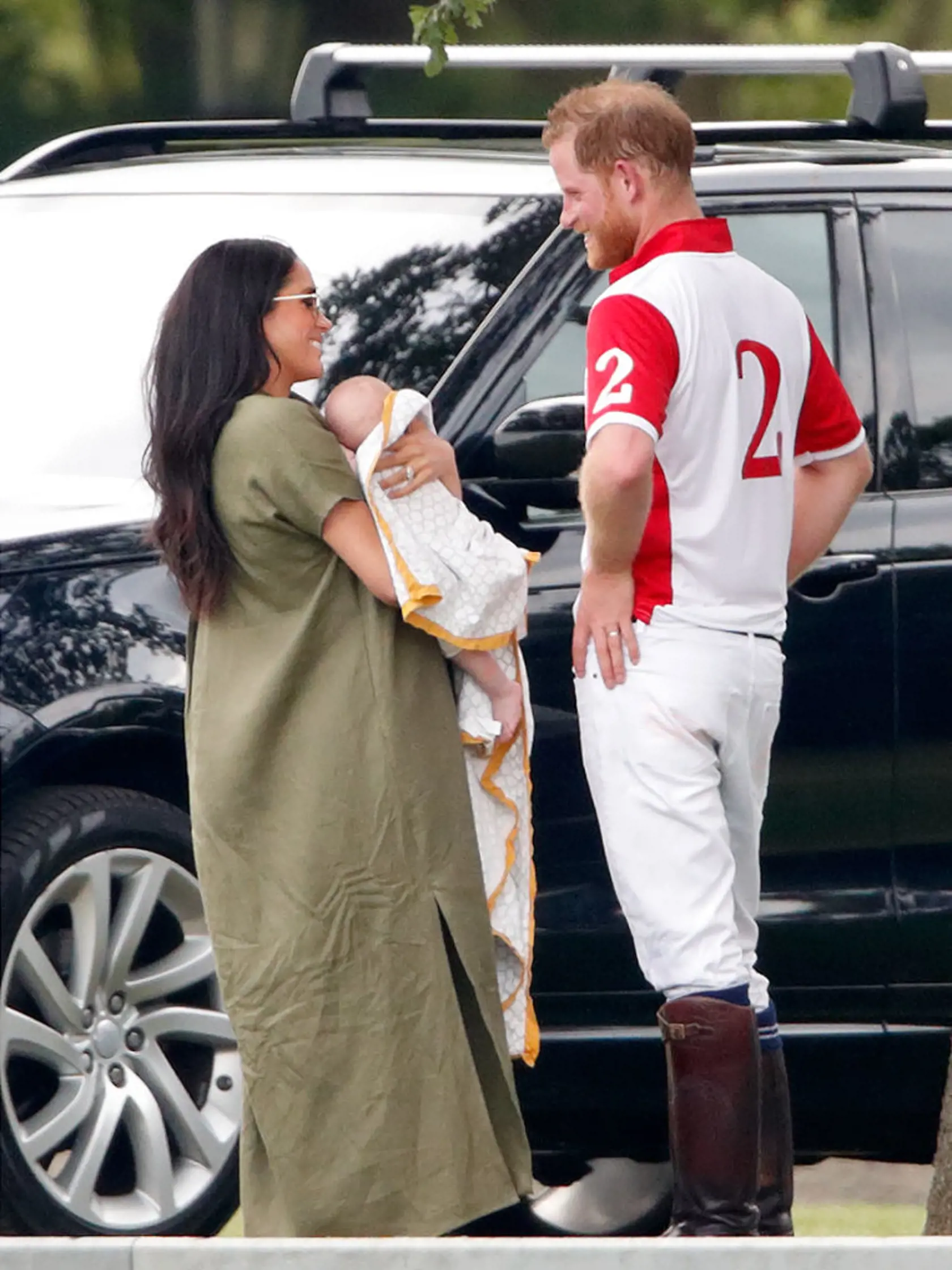 WOKINGHAM, UNITED KINGDOM - JULY 10: (EMBARGOED FOR PUBLICATION IN UK NEWSPAPERS UNTIL 24 HOURS AFTER CREATE DATE AND TIME) Meghan, Duchess of Sussex, Archie Harrison Mountbatten-Windsor and Prince Harry, Duke of Sussex attend the King Power Royal Charity Polo Match, in which Prince William, Duke of Cambridge and Prince Harry, Duke of Sussex were competing for the Khun Vichai Srivaddhanaprabha Memorial Polo Trophy at Billingbear Polo Club on July 10, 2019 in Wokingham, England. (Photo by Max Mum