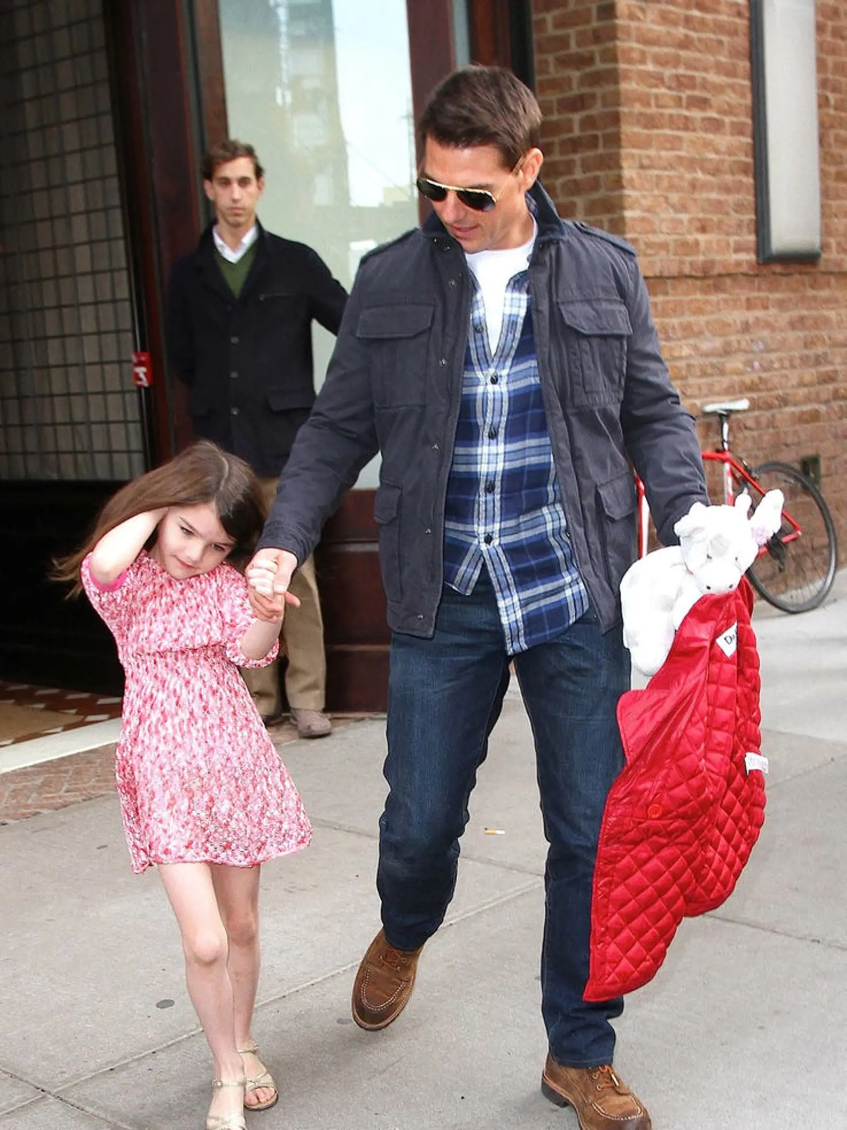 Suri Cruise bola kedysi opisovaná ako najsmutnejšie dieťa Hollywoodu, lebo  a vôbec neusmievala.
