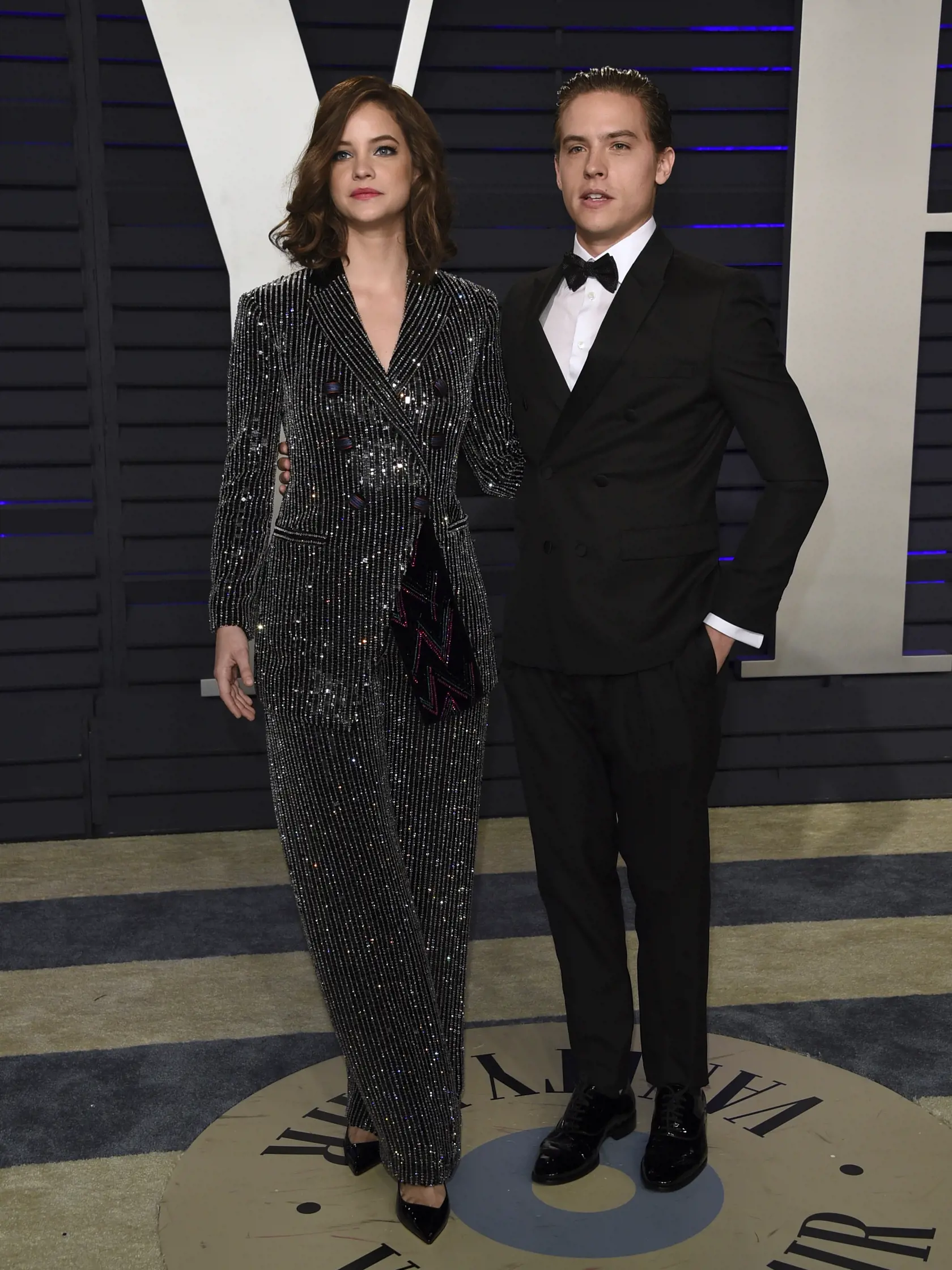 Barbara Palvin, left, and Dylan Sprouse arrive at the Vanity Fair Oscar Party on Sunday, Feb. 24, 2019, in Beverly Hills, Calif. (Photo by Evan Agostini/Invision/AP)