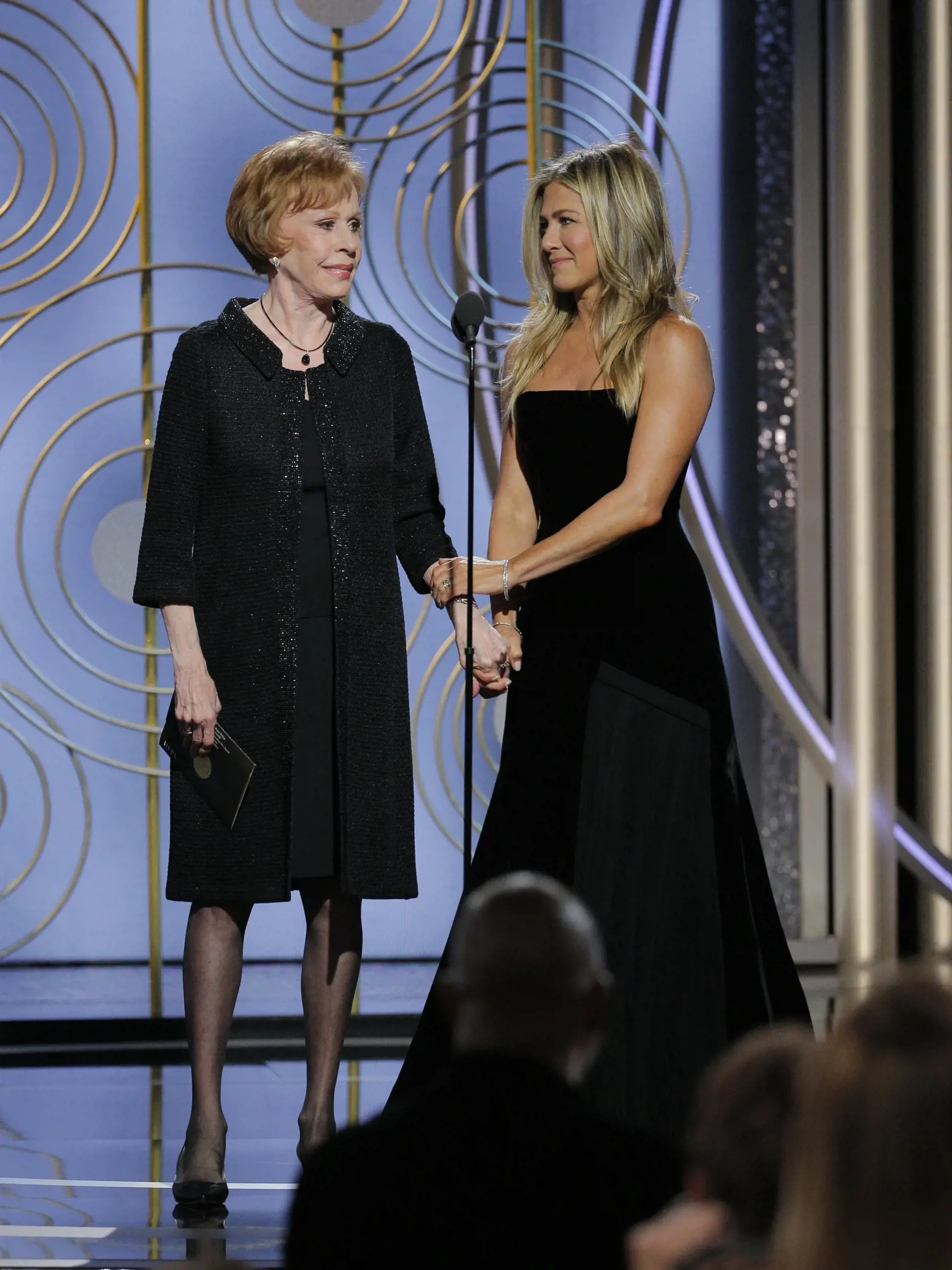 BEVERLY HILLS, CA - JANUARY 07:  In this handout photo provided by NBCUniversal,  Presenters Carol Burnett and Jennifer Aniston onstage during the 75th Annual Golden Globe Awards at The Beverly Hilton Hotel on January 7, 2018 in Beverly Hills, California.  (Photo by Paul Drinkwater/NBCUniversal via Getty Images)