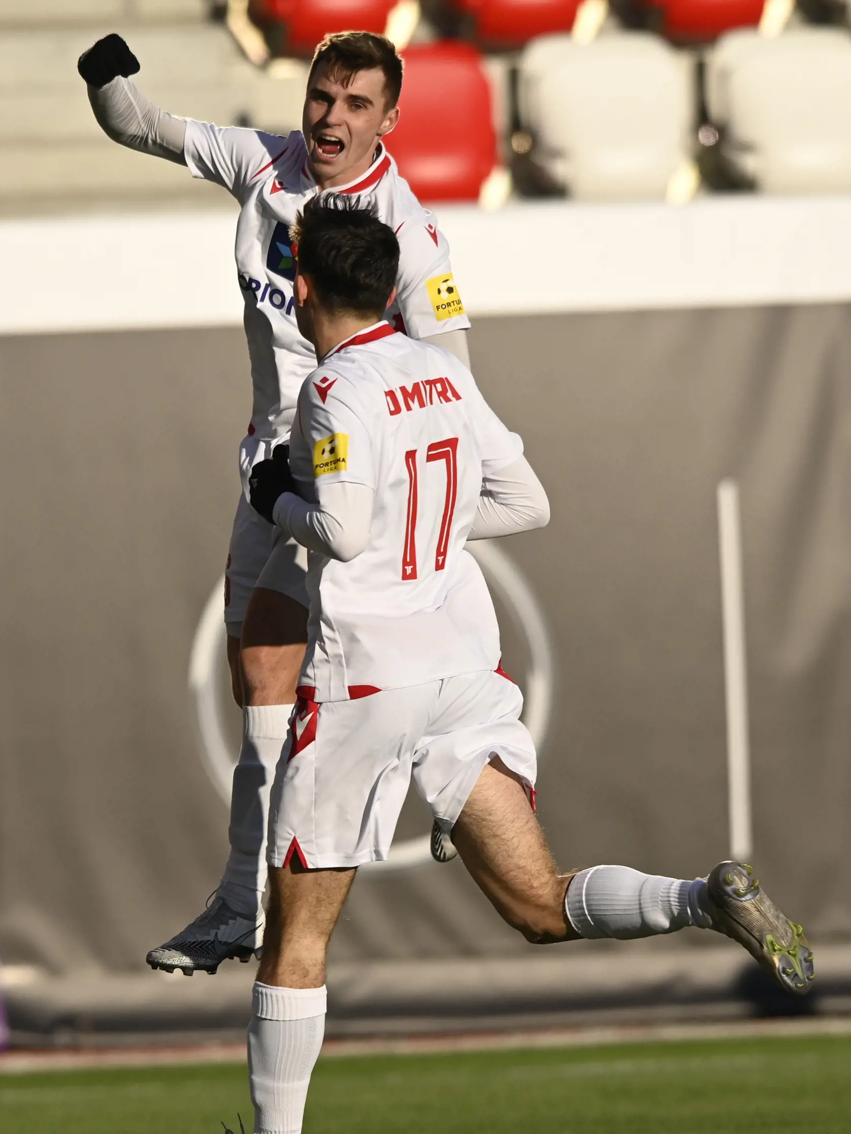 Na snímke zľava Jakub Kadák (AS Trenčín) a Lucas Demitra (AS Trenčín) sa tešia po strelení gólu počas zápasu 19. kola Fortuna ligy AS Trenčín - FK DAC 1904 Dunajská Streda, 14. februára 2021 v Trenčíne. FOTO TASR - Radovan Stoklasa