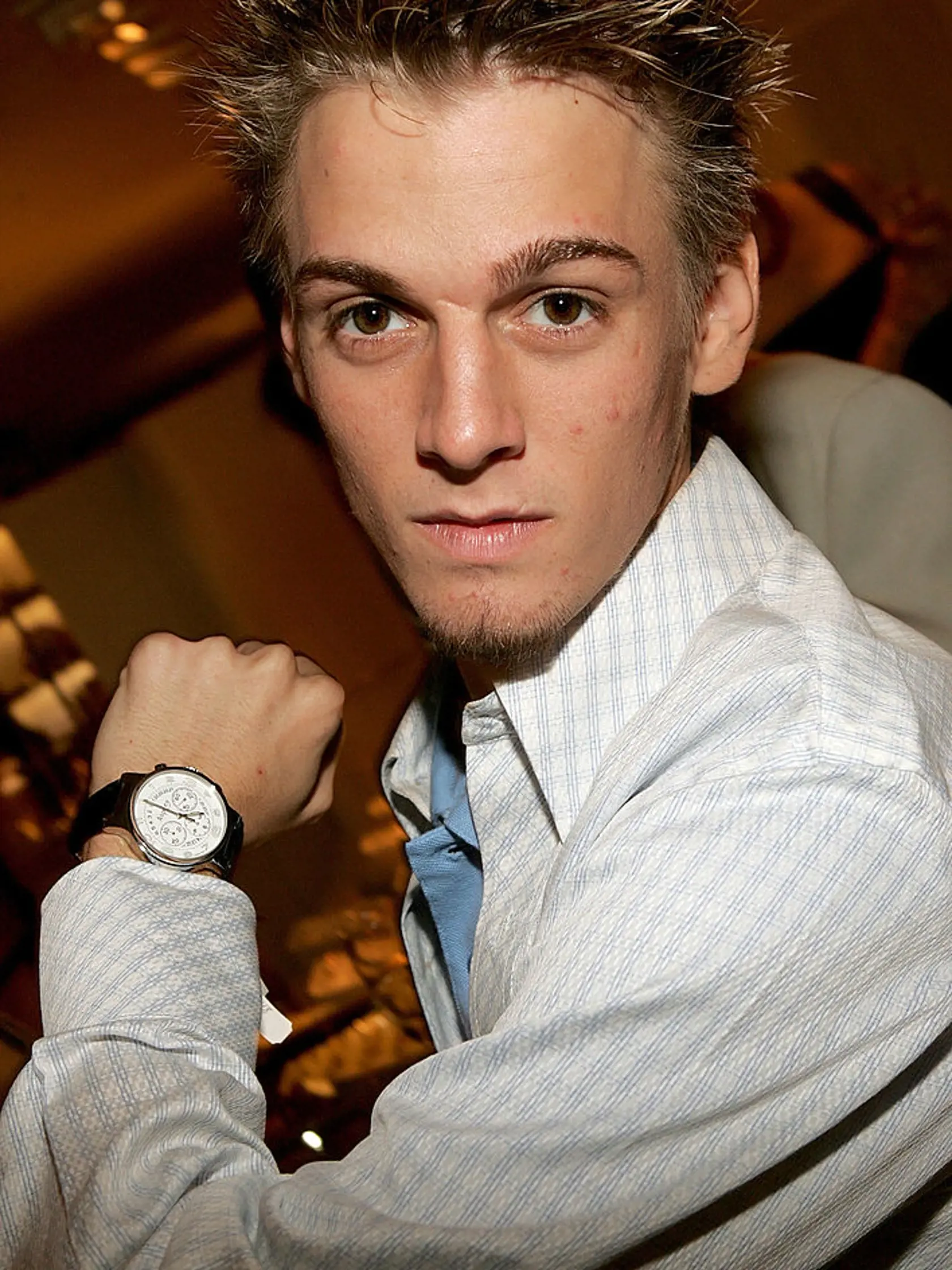 NEW YORK - JUNE 30:  Singer Aaron Carter tries on a Number 8 Chronograph watch during Asprey's shopping event to benefit VH-1 Save the Music Foundation at Asprey June 30, 2005 in New York City.  (Photo by Paul Hawthorne/Getty Images)