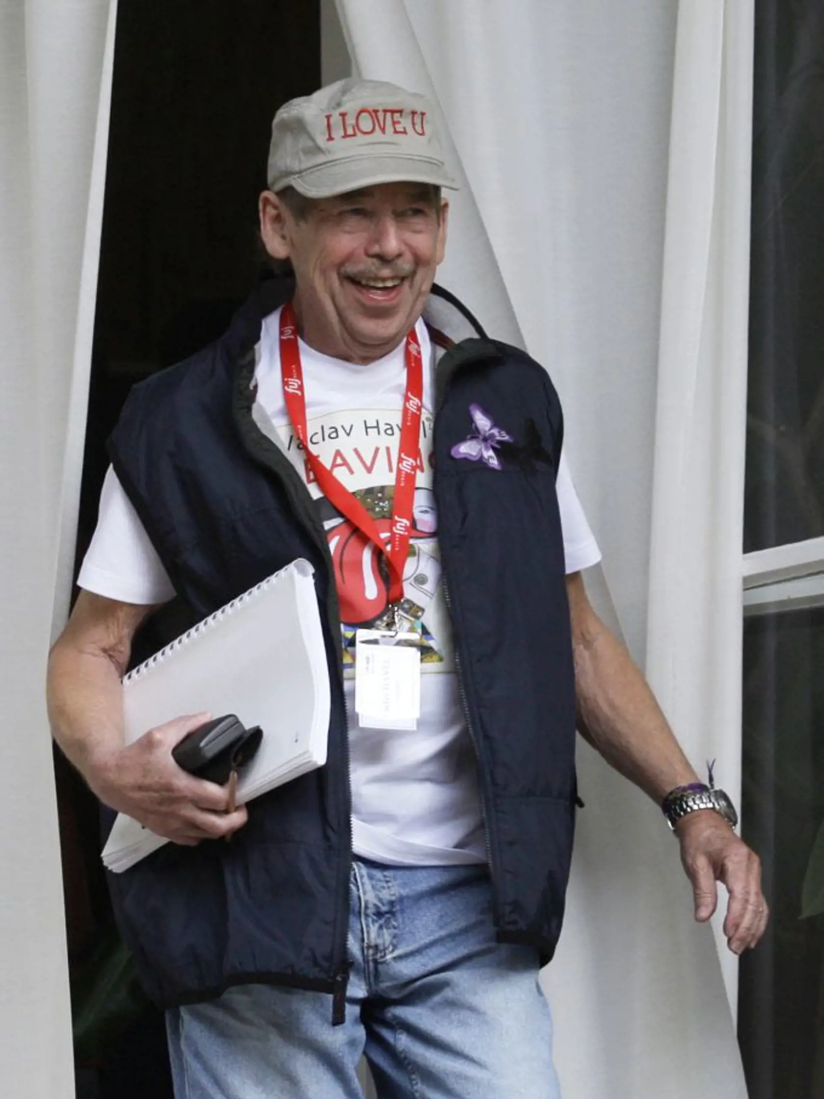 Former Czech Republic's President, author and director Vaclav Havel walks to a set during the shooting of his movie "Leaving" in Ceska Skalice, Czech Republic, Tuesday, July 20, 2010. Havel is making his debut as movie director with film based on "Leaving" his first play in twenty years. (AP Photo/Petr David Josek)