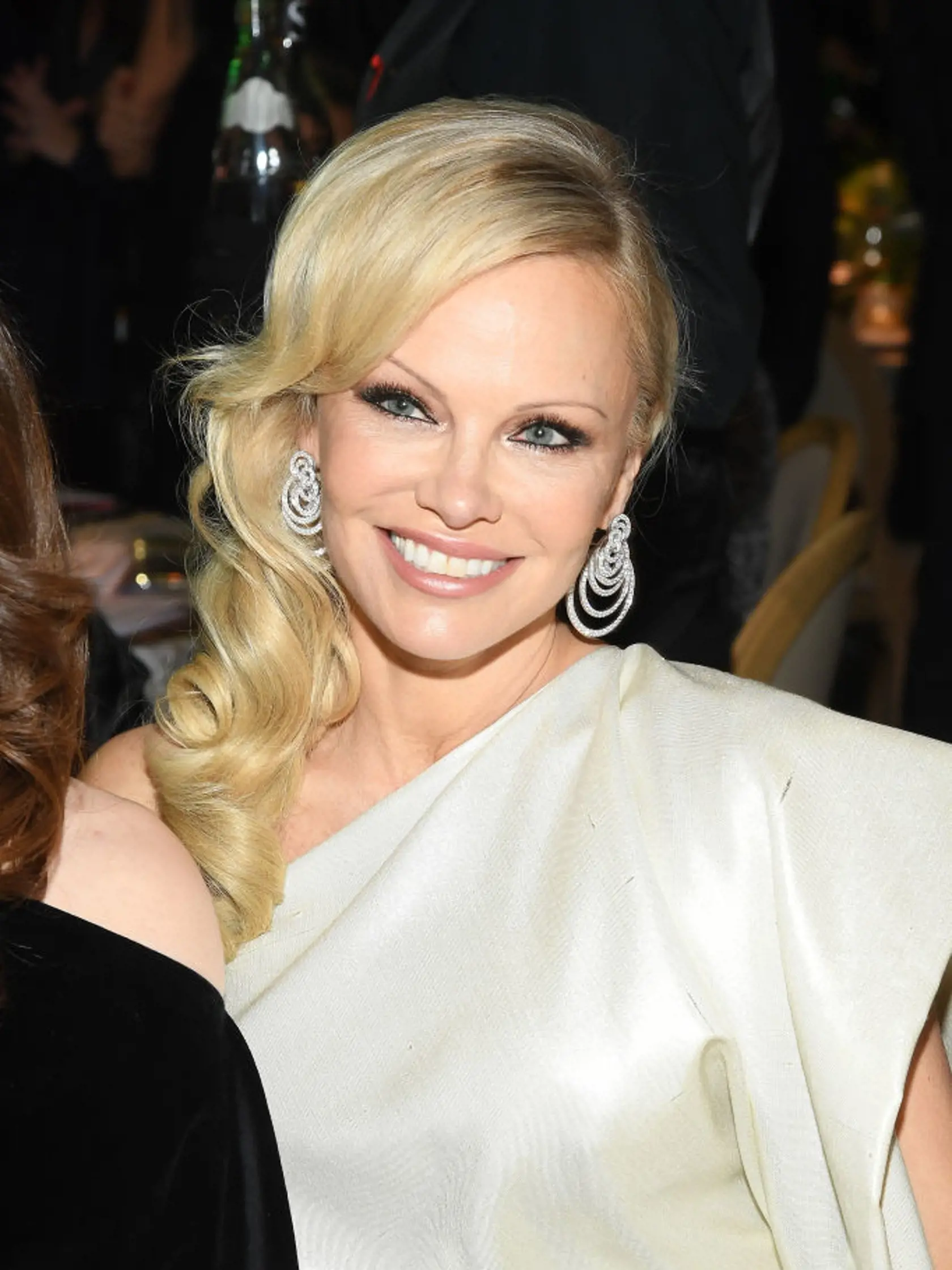 PARIS, FRANCE - JANUARY 22: Pamela Anderson attends the 17th "Diner De La Mode" as part of Paris Fashion Week on January 22, 2019 in Paris, France. (Photo by Pascal Le Segretain/Getty Images)