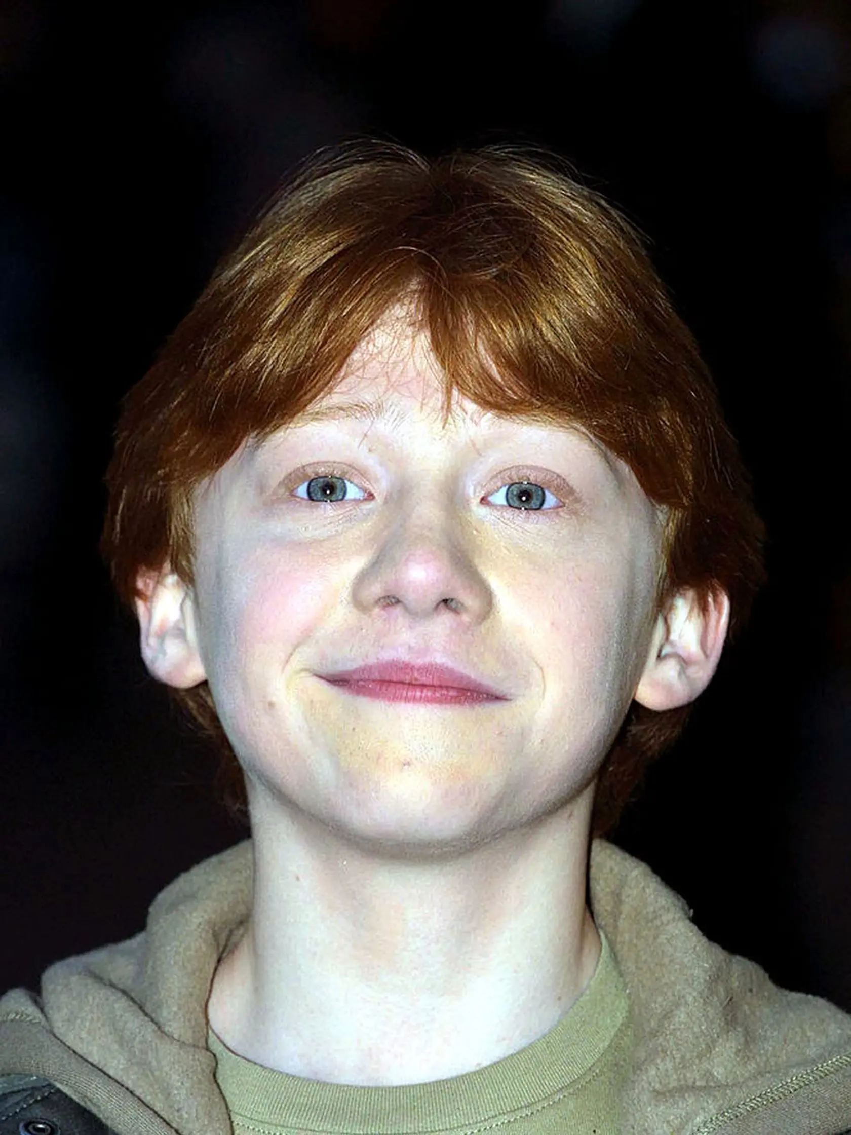 Rupert Grint si vo filmoch zahral Rona Weasleyho.