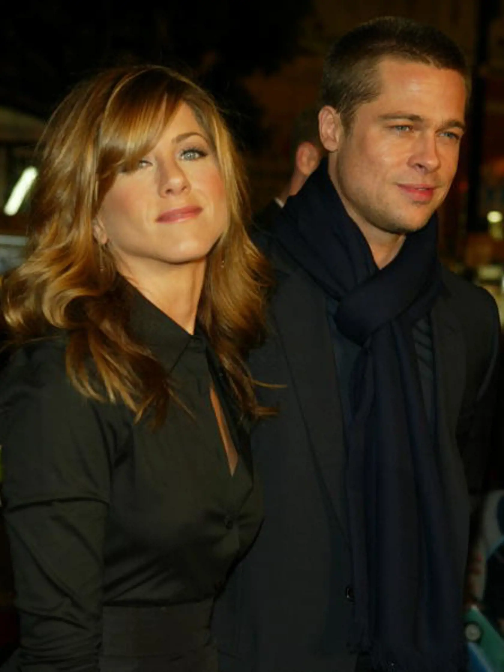 HOLLYWOOD - JANUARY 12:  Actress Jennifer Aniston and actor Brad Pitt attend the Los Angeles premiere of Universal Pictures' film "Along Came Polly" at the Grauman's Chinese Theatre January 12, 2004 in Hollywood, California.  (Photo by Kevin Winter/Getty Images)