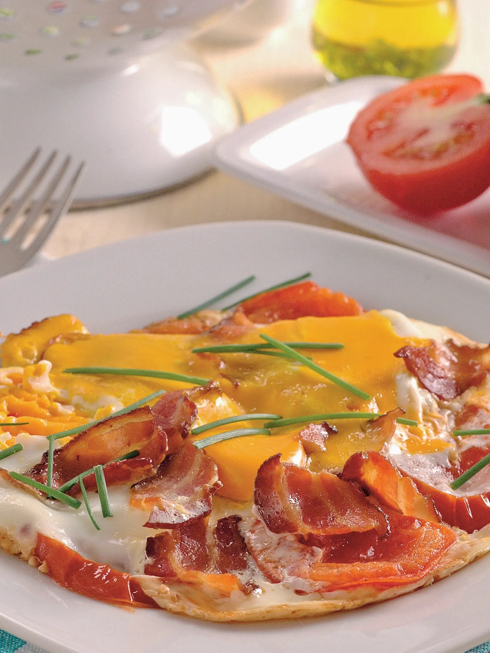 Vajcia na paradajkách, recept, syr, slanina
Foto: Peter Záhradník
Uverejnené: Báječná Žena č. 26/09
pôvodný súbor:vajcia na paradajkach 1.eps