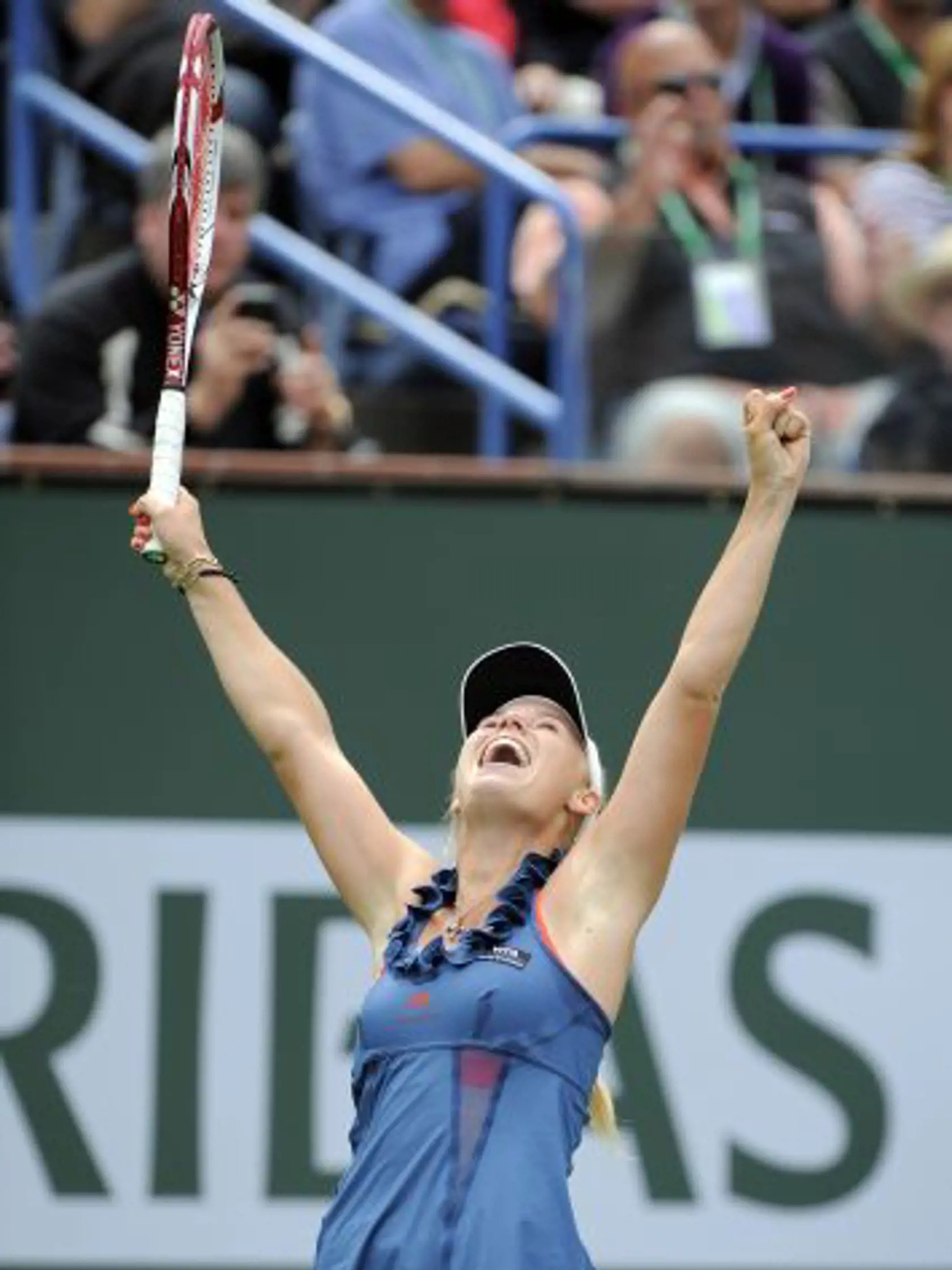 Caroline Wozniacki, of Denmark, reacts after defeating Marion Bartoli, of France, in the women's final at the BNP Paribas Open tennis tournament, Sunday, March 20, 2011, in Indian Wells, Calif. Wozniacki won 6-1, 2-6, 6-3.  (AP Photo/Mark J. Terrill)