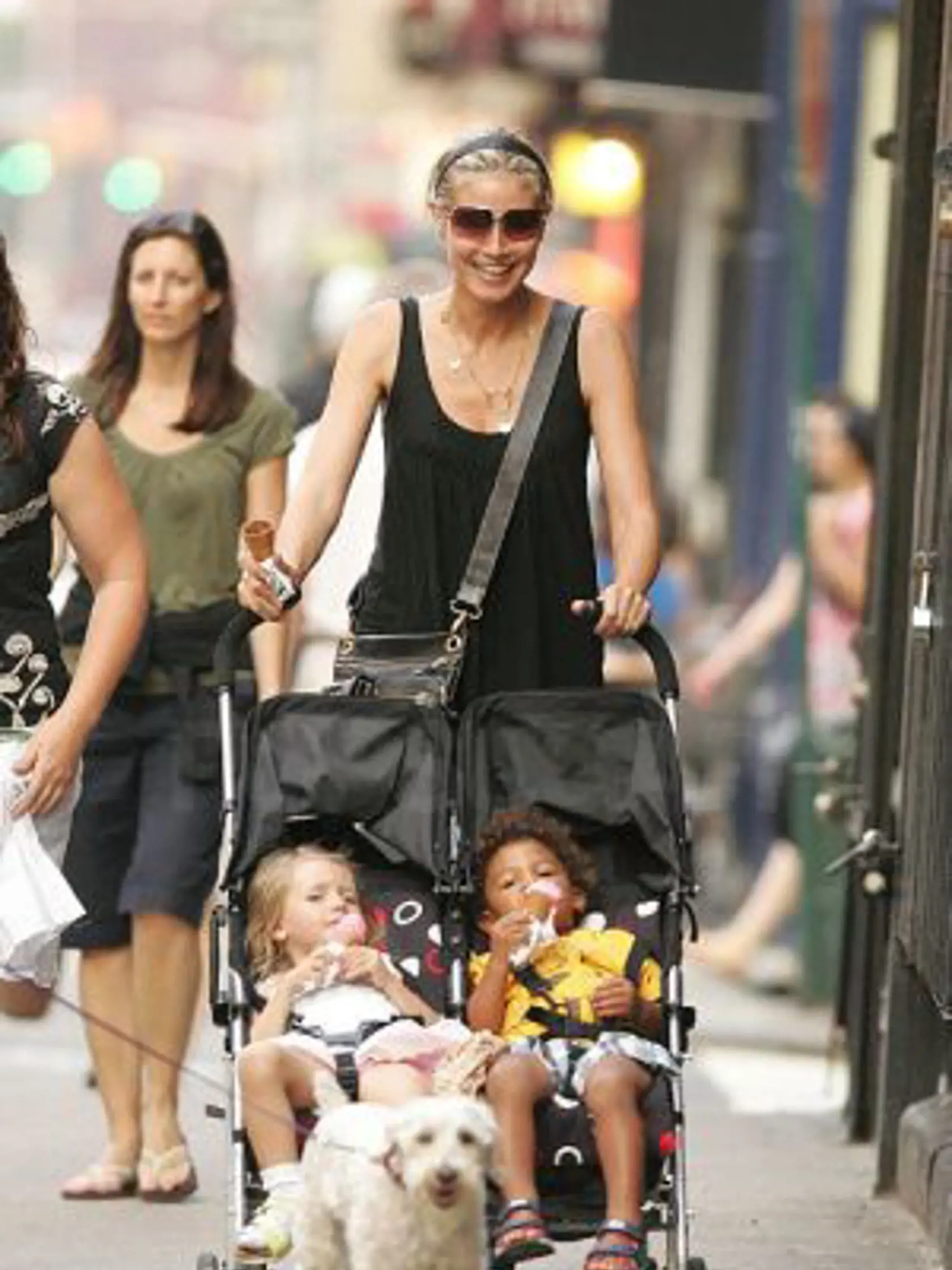 15651, NEW YORK, NEW YORK - Sunday May 27 2007. RESTRICTIONS: GERMANY OUT FRANCE OUT ITALY OUT AUSTRALIA OUT NEW ZEALAND OUT EASTERN EUROPE OUT. Heidi Klum proves she's a good mum whilst strolling with two of her children in Greenwich Village, New York. The German supermodel spotted that daughter Leni and son Henry were getting a little fractious in their double buggy, so Heidi headed straight to the nearest ice cream store to get a sweet treat for everyone. The frayed tempers were soon soothed 