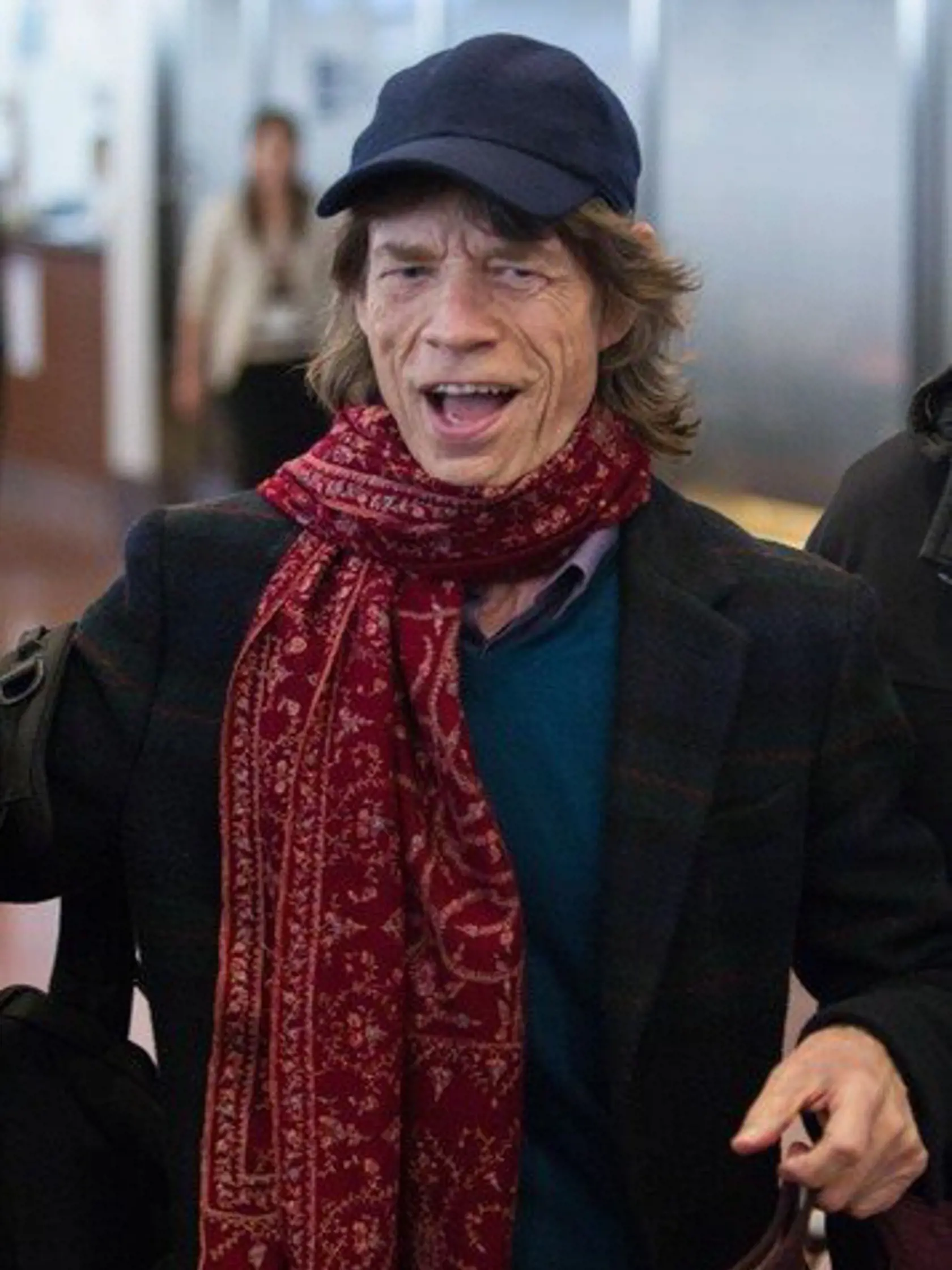 (FILE) A file picture dated 23 February 2014 shows member of British rock band The Rolling Stones, Mick Jagger (L), upon his arrival at Tokyo's Haneda International Airport in Tokyo, Japan. Mick Jagger that has seven children and four grandchildren, became greatgrandfather over the weekend according to media reports on 20 May 2014 when his granddaughter Assisi Jackson, 21, gave birth to a baby girl., Image: 237771513, License: Rights-managed, Restrictions: , Model Release: no, Credit line: Profi