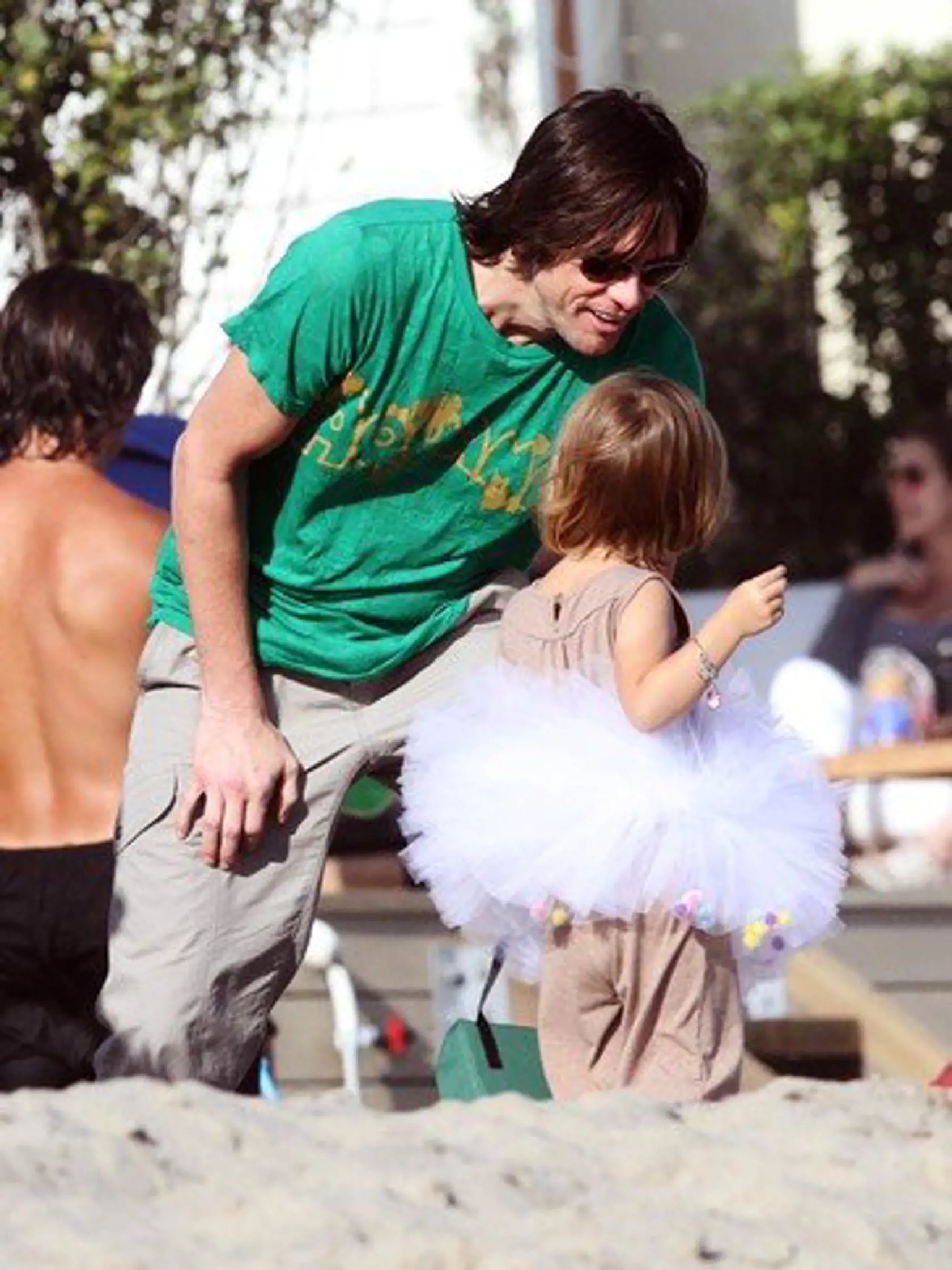 #5331137 Comedian Jim Carrey enjoys his fourth of July on the beach at his home in Malibu, CA on July 4, 2010 with his daughter Jane Carrey, grandson Jackson Riley Santana and friend Gary Oldman., Image: 76455050, License: Rights-managed, Restrictions: , Model Release: no, Credit line: Profimedia, Famepictures