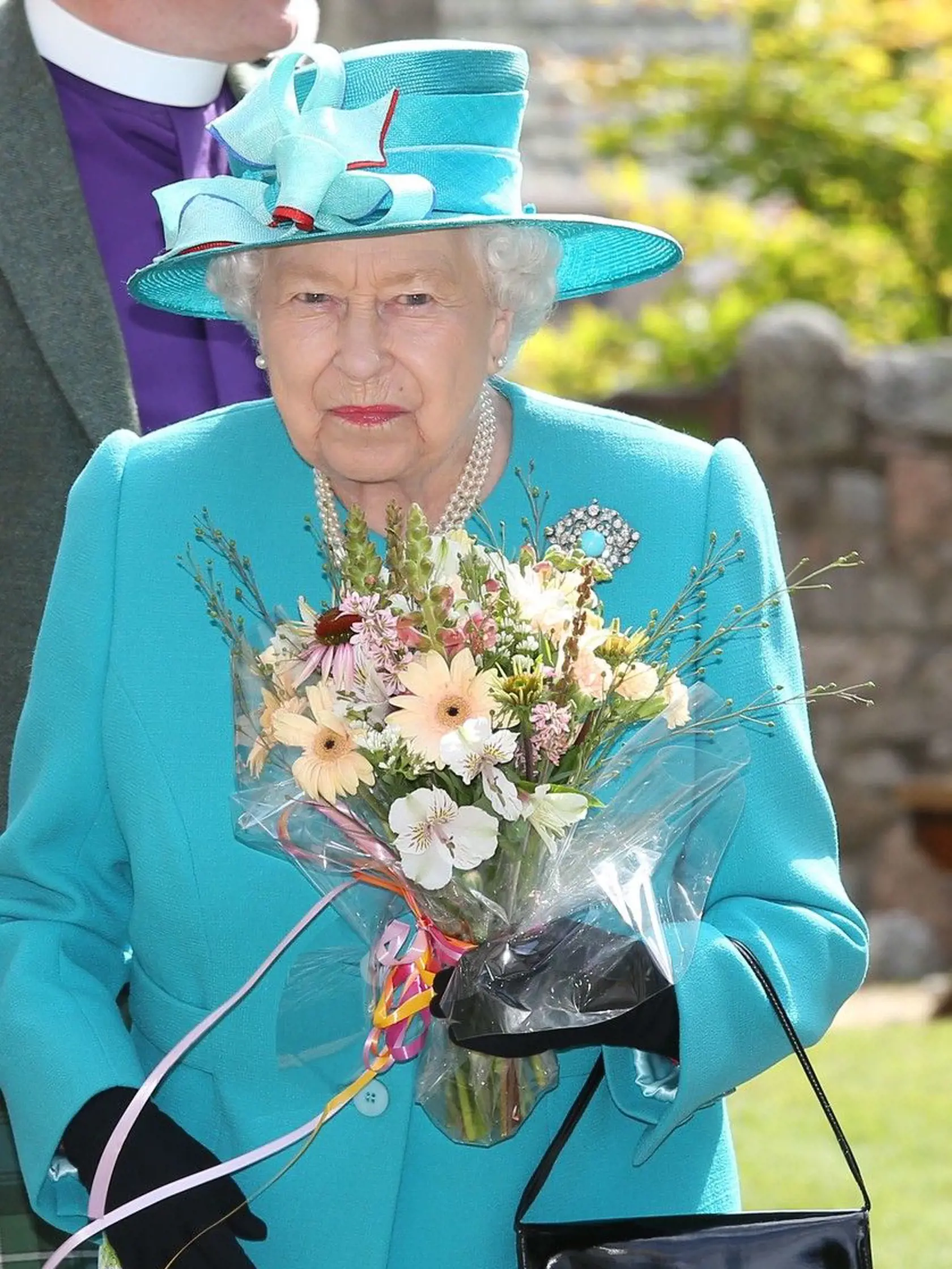 Kráľovná Alžbeta, Meghna Markle, princ Harry