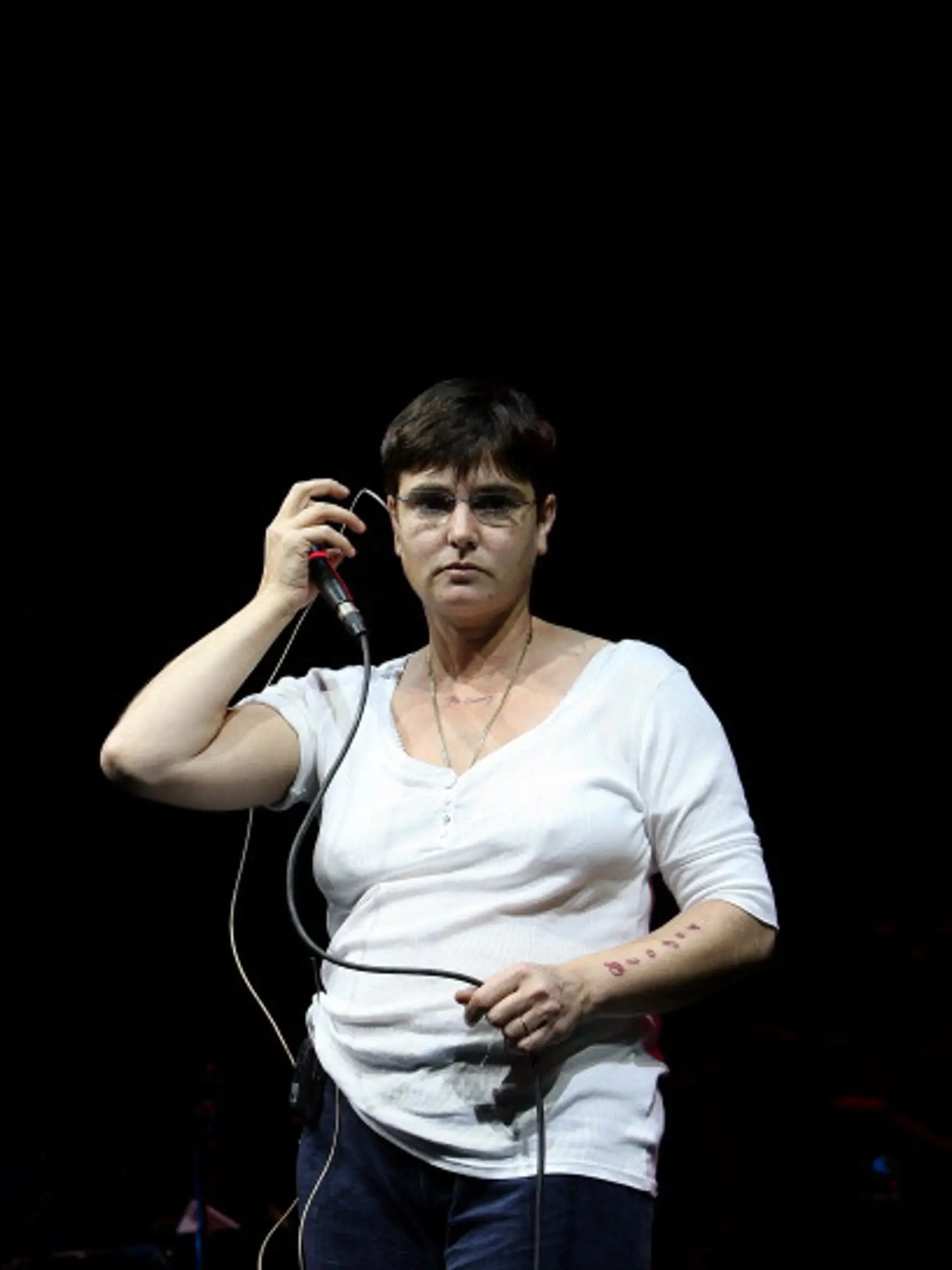 MELBOURNE, AUSTRALIA - OCTOBER 22:  Sinead O'Connor performs on stage during a dress rehearsal for 'Seven Songs to Leave Behind' the Melbourne Festival finale concert at Sidney Myer Music Bowl on October 22, 2010 in Melbourne, Australia.  (Photo by Graham Denholm/Getty Images)