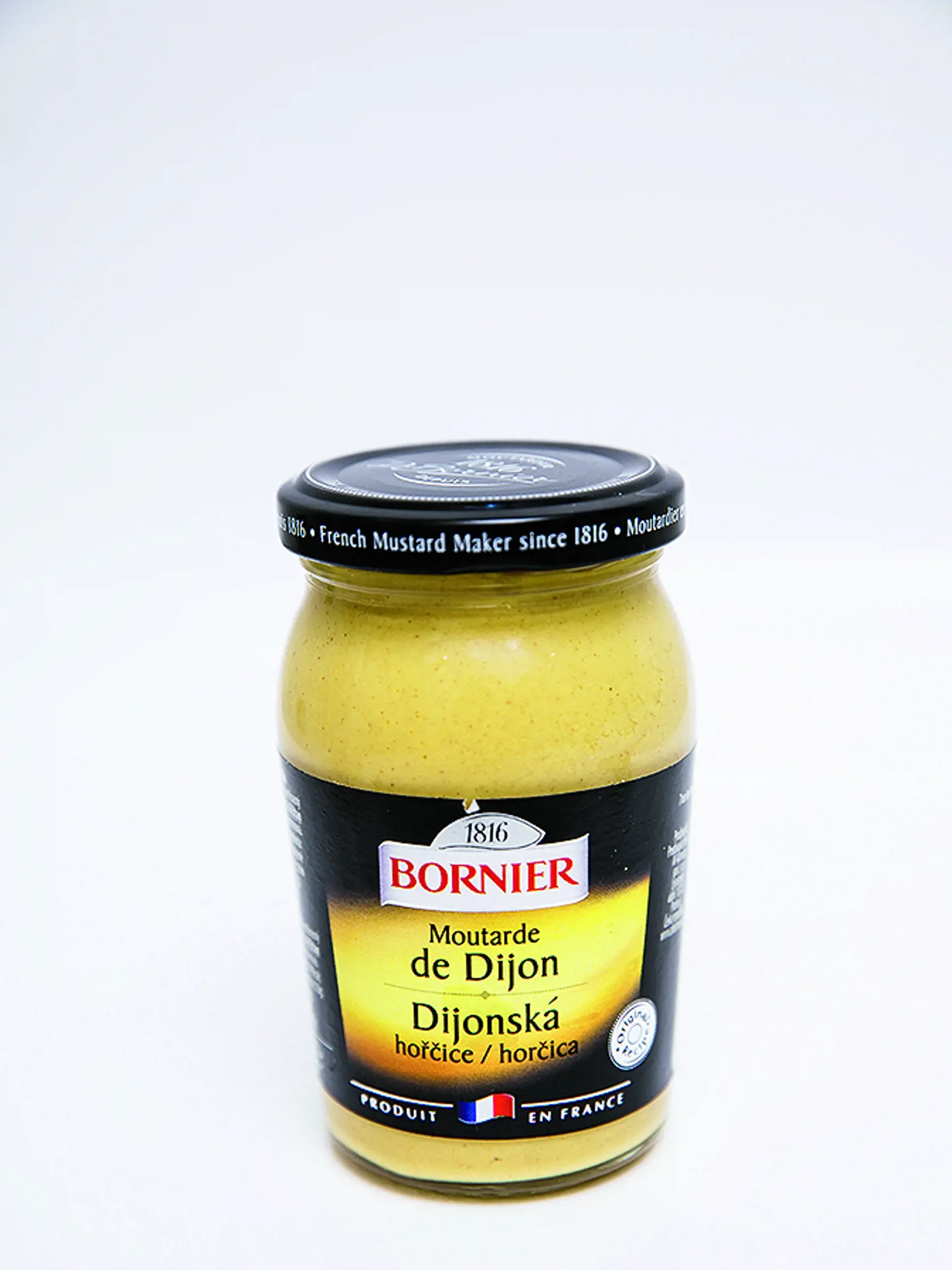 Dijonská horčica Bornier, 210 g Cena za 100 g: 0,85 € Krajina pôvodu/ Francúzsko Zloženie/ pitná voda, horčicové semená, kvasný liehový ocot, jedlá soľ max. 7 %, antioxidant: disiričitan draselný, regulátor kyslosti: kyselina citrónová Energia v 100 g/ 619 kJ Bielkoviny/ 7,2 g Sacharidy/ 3,2 g Tuky/ 11,5 g Soľ/ 6,5 g REDAKCIA HODNOTÍ: Svetložltá horčica s mierne octovou arómou má stredne hustú konzistenciu a trocha drsnejšiu textúru. Chuťovo je veľmi dobrá – pikantná, kyslastoslaná. „Dijonská“ o