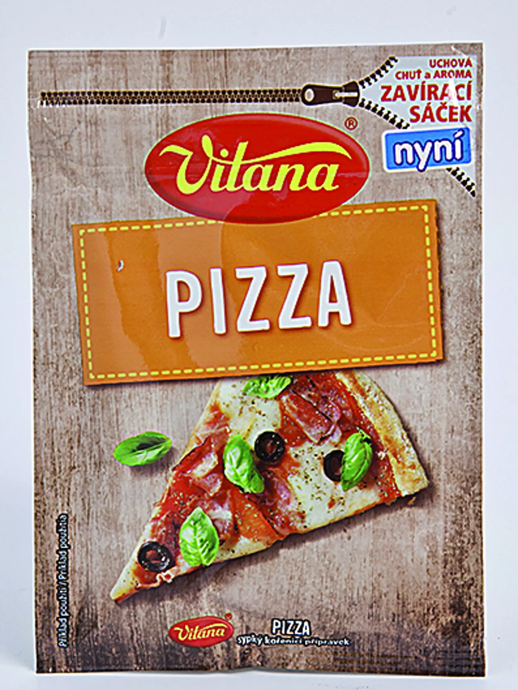 PIZZA VITANA, 20 g 
Krajina pôvodu Česko. Zloženie: jedlá soľ 37 %, oregano, sušená mletá cibuľa a cesnak, sušená drvená červená a zelená paprika, mletá šalvia, drvené čierne korenie, bazalka, sušené drvené rajčiny, majorán, sušená petržlenová vňať, tymian, mletý koriander. Energia v 100 g/ 890 kJ Bielkoviny/ 8,1 g Sacharidy/ 30,1 g Tuky/ 4,1 g Soľ/ 37 g
REDAKCIA HODNOTÍ: Najpestrejšia, najfarebnejšia a silno aromatická zmes má stredne hrubú štruktúru. Cesnak jej dodáva pikantnú až štipľavú do
