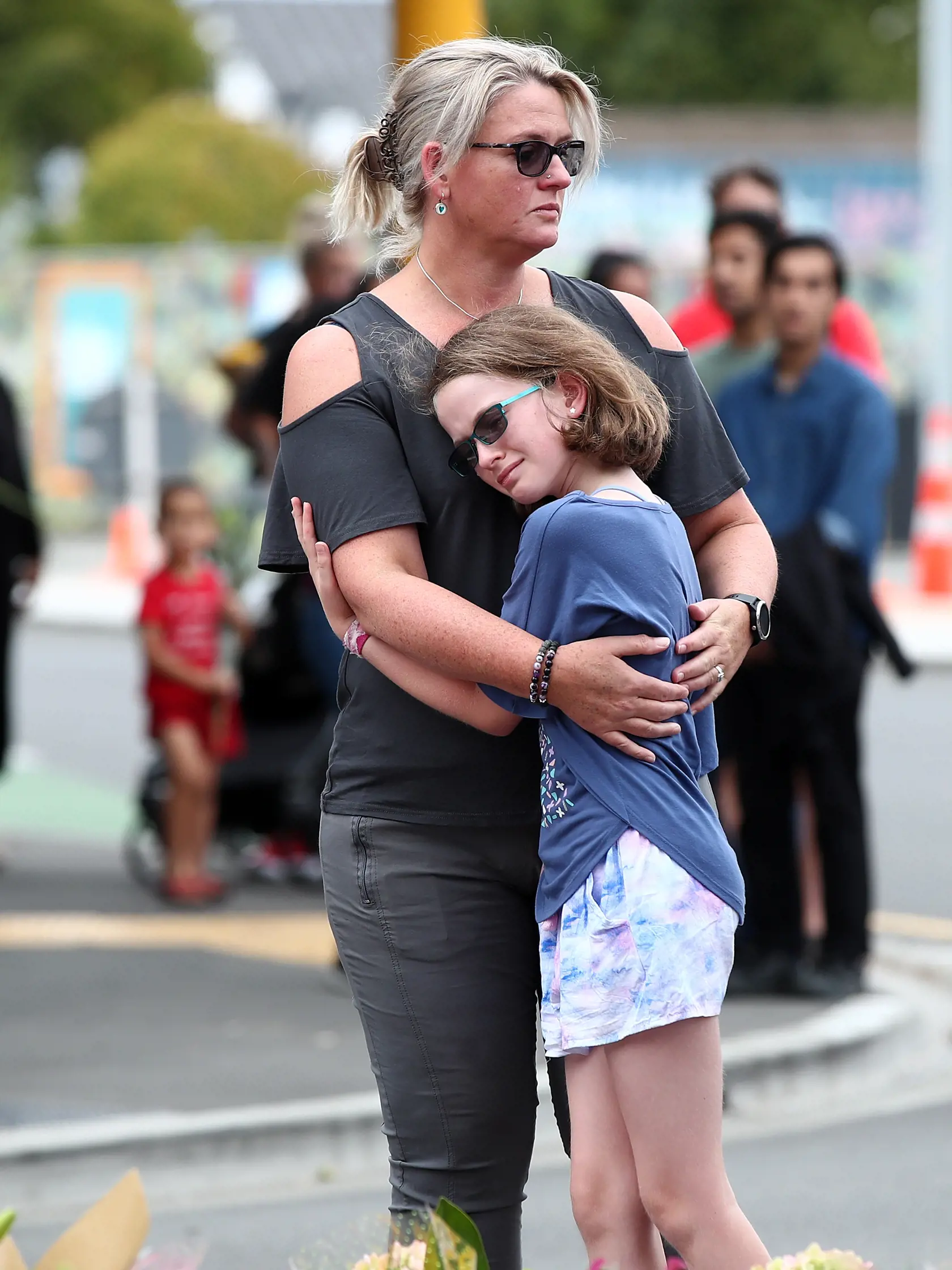 CHRISTCHURCH, NEW ZEALAND - MARCH 16: Locals mourn and leave tributes at Deans Rd near the Al Noor mosque on March 16, 2019 in Christchurch, New Zealand. At least 49 people are confirmed dead, with more than 40 people injured following attacks on two mosques in Christchurch on Friday afternoon. 41 of the victims were killed at Al Noor mosque on Deans Avenue and seven died at Linwood mosque. Another victim died later in Christchurch hospital. Three people are in custody over the mass shootings. O