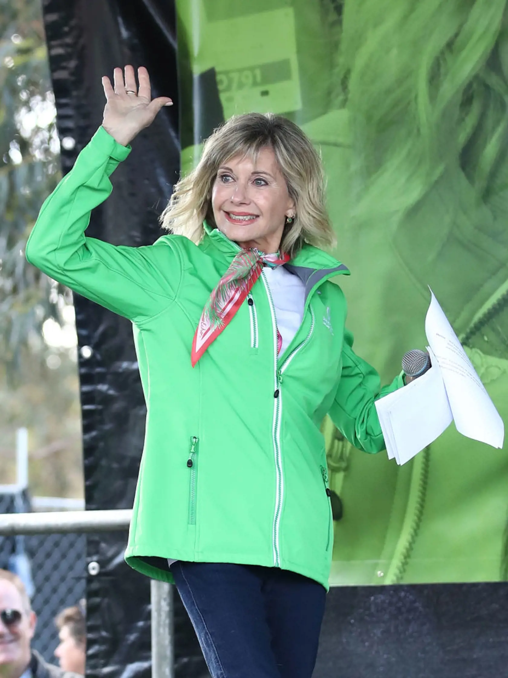 MELBOURNE, AUSTRALIA - SEPTEMBER 16:  Olivia Newton-John waves during the annual Wellness Walk and Research Runon September 16, 2018 in Melbourne, Australia. The annual event, now in it's sixth year, raises vital funds to support cancer research and wellness programs at the Olivia Newton-John Cancer Wellness and Research Centre in Victoria.  (Photo by Scott Barbour/Getty Images)