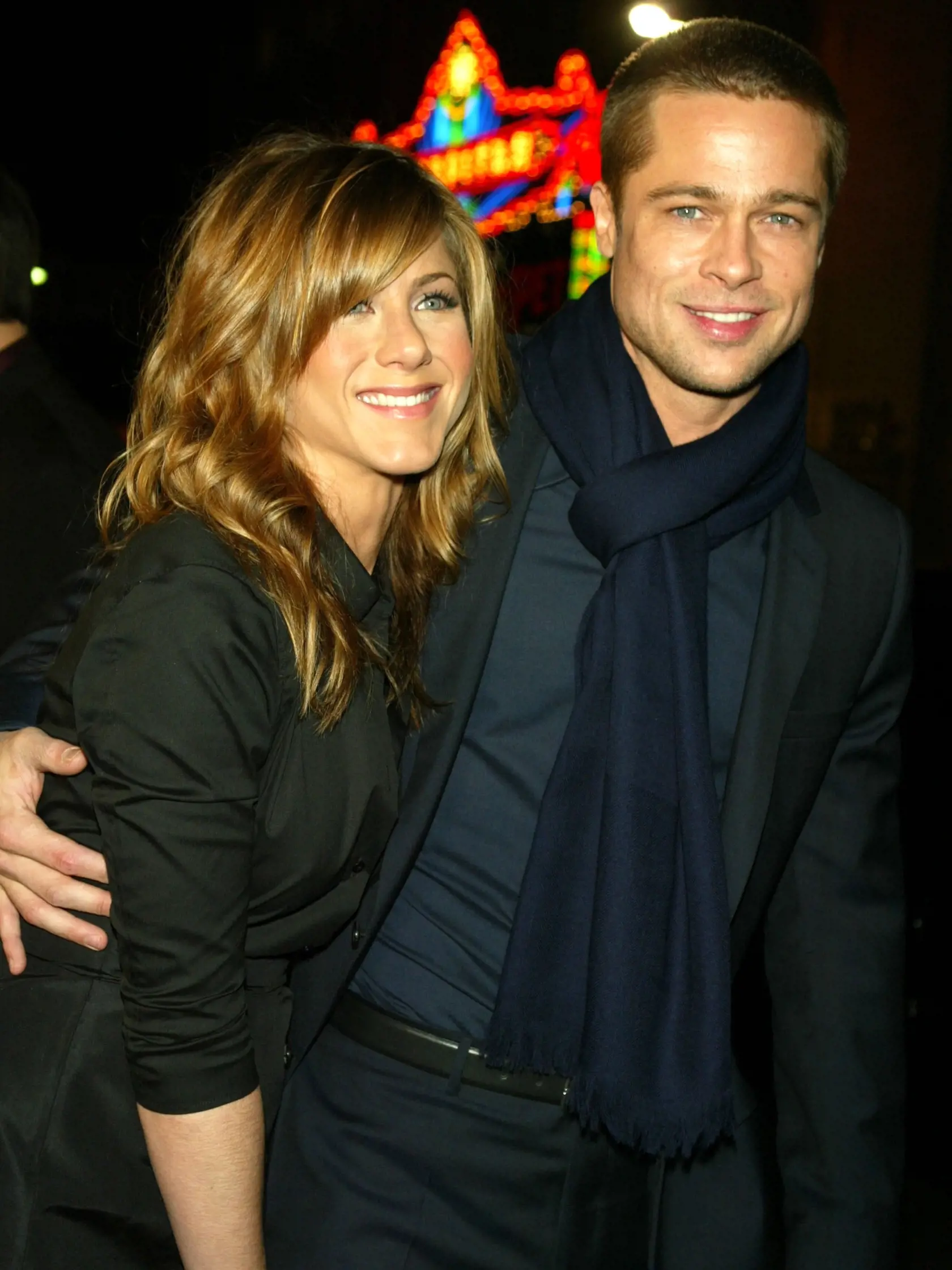 American actress Jennifer Aniston and actor Brad Pitt attend the Los Angeles premiere of Universal Pictures' film 'Along Came Polly' at the Grauman's Chinese Theatre Hollywood, California, January 12, 2004. (Photo by Kevin Winter/Getty Images)