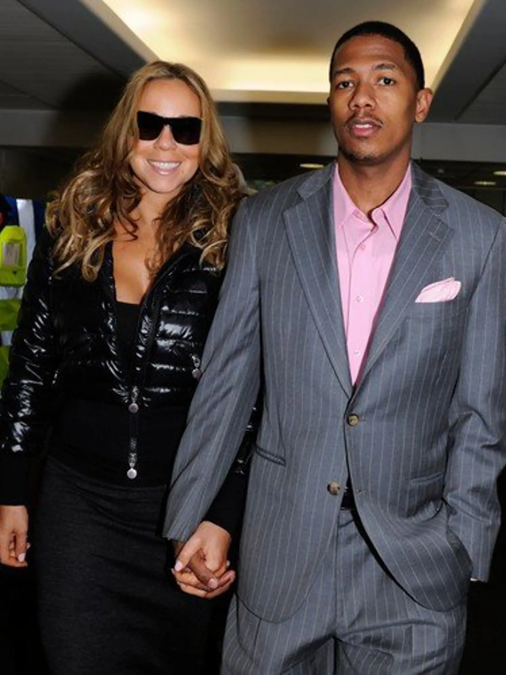 D 91295-06   Mariah Carey and Nick Cannon.   . Mariah Carey and husband Nick Cannon arrive at Heathrow Airport from New York., Image: 54441505, License: Rights-managed, Restrictions: , Model Release: no, Credit line: Profimedia, TEMP Camerapress