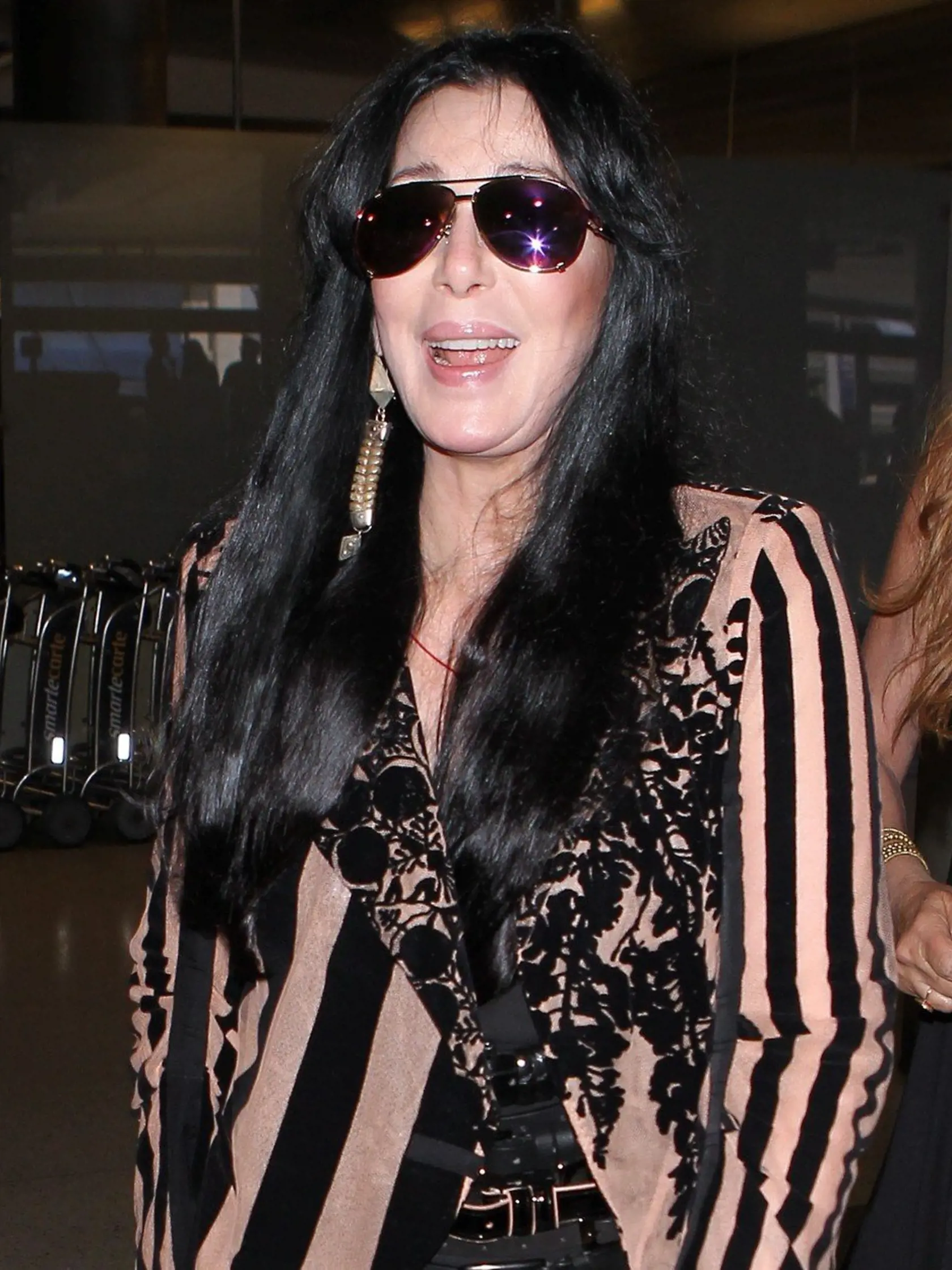 Cher arriving at LAX in a striped blazer. June 22, 2015, Image: 250786764, License: Rights-managed, Restrictions: , Model Release: no, Credit line: Profimedia, X17
