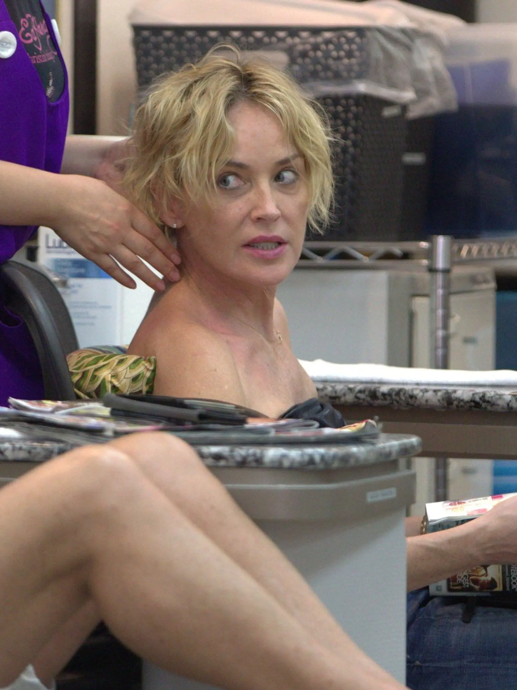 51804654 Actress Sharon Stone stops by a nail salon for a mani/pedi in Beverly Hills, California on July 20, 2015. During her manicure, Sharon read an OK! Magazine., Image: 253445959, License: Rights-managed, Restrictions: , Model Release: no, Credit line: Profimedia, FameFlynet USA