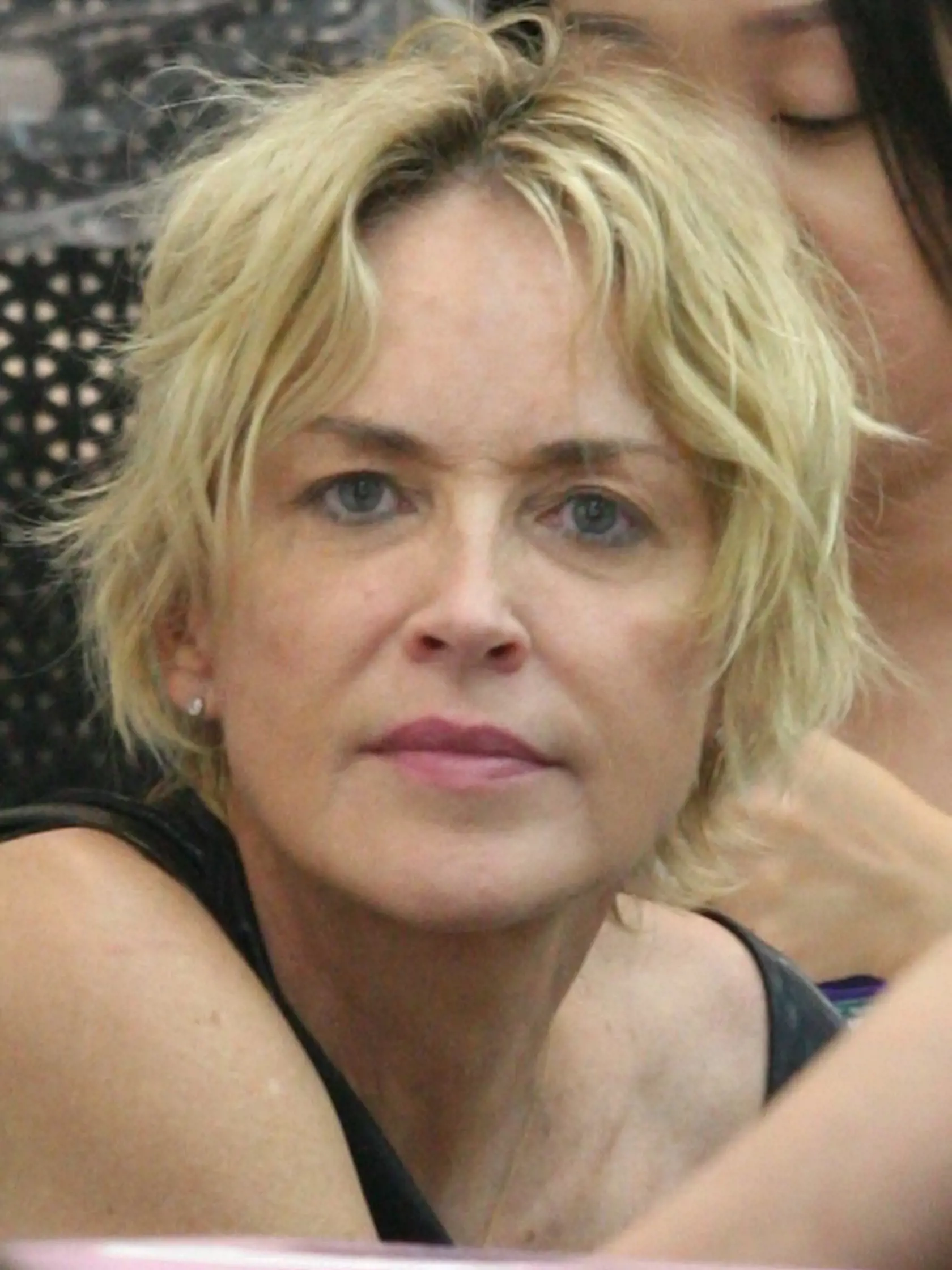 Beverly Hills, CA - Actress Sharon Stone stops by Beverly Hills Nail Design and picks up a new color for her nails, she wore a black sleeveless blouse with matching leather boots and jeans.     July 20, 2015, Image: 253445008, License: Rights-managed, Restrictions: NO Brazil, Model Release: no, Credit line: Profimedia, AKM-GSI