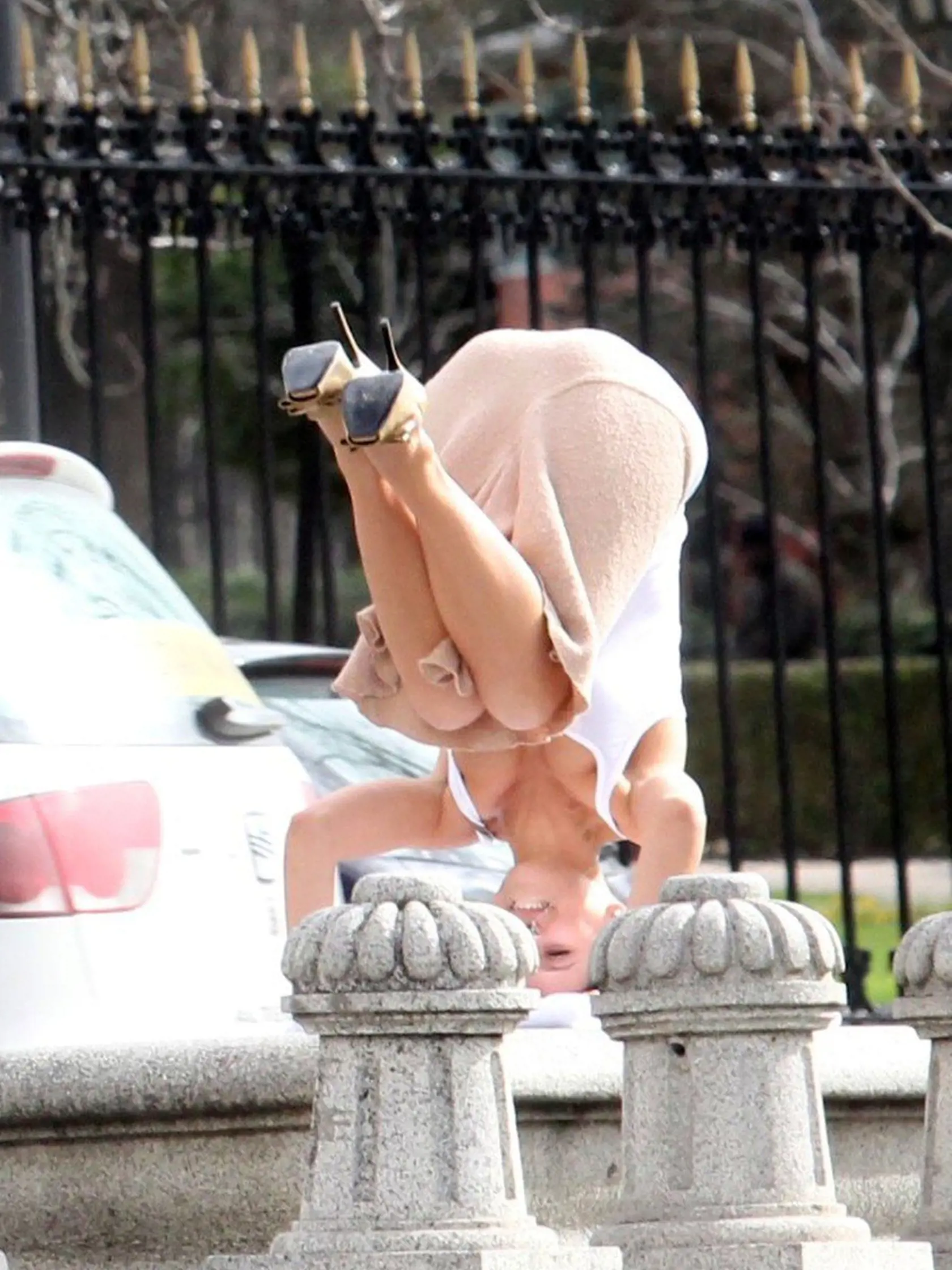 **ALL ROUND PICTURES FROM SOLARPIX.COM** **WORLDWIDE SYNDICATION RIGHTS EXCEPT SPAIN - NO SYNDICATION IN SPAIN** Caption: Spanish wife of Hollywood actor Alec Balwin , Hilary Thomas 26 yrs practices here Yoga for a photo shoot in a Madrid park watched by her their new baby Carmen. This pic: Hilaria Thomas Balwin JOB REF: 16987       RAM       DATE: 14.02.2014 **MUST CREDIT SOLARPIX.COM OR DOUBLE FEE WILL BE CHARGED** **MUST AGREE FEE BEFORE ONLINE USAGE** **CALL US ON: +34 952 811 768 or LOW RAT
